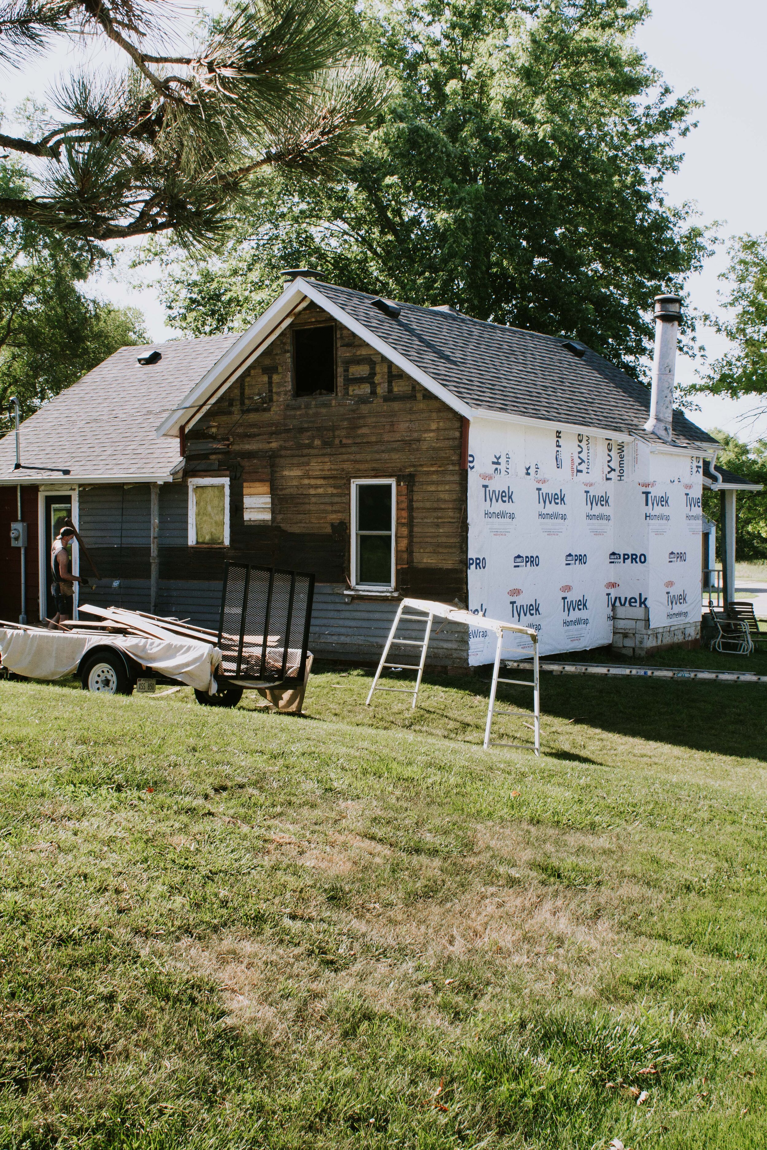 House exterior update: The old siding is gone and tyvek is on! Our siding game plan and the material we chose! | Nadine Stay