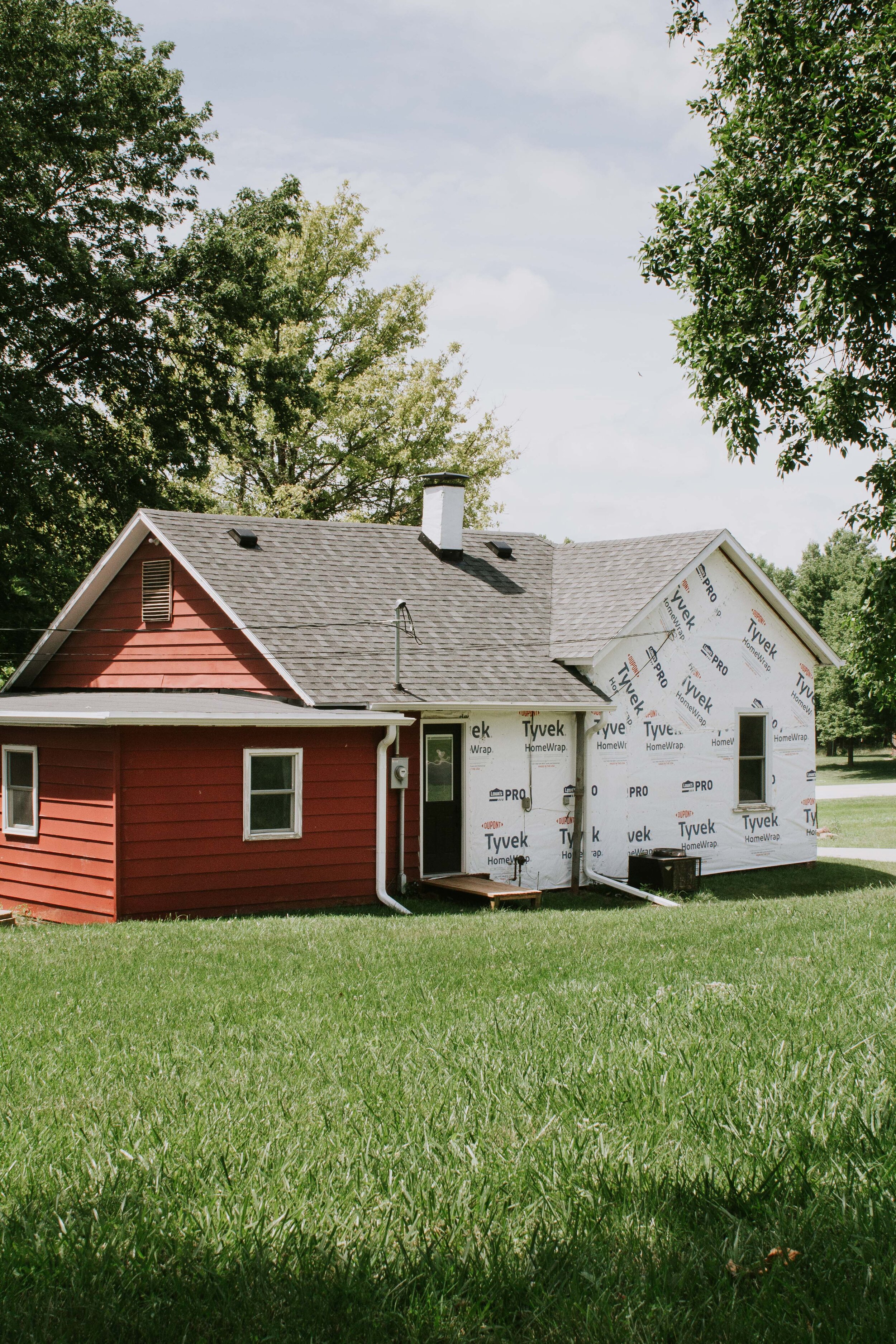 House exterior update: The old siding is gone and tyvek is on! Our siding game plan and the material we chose! | Nadine Stay