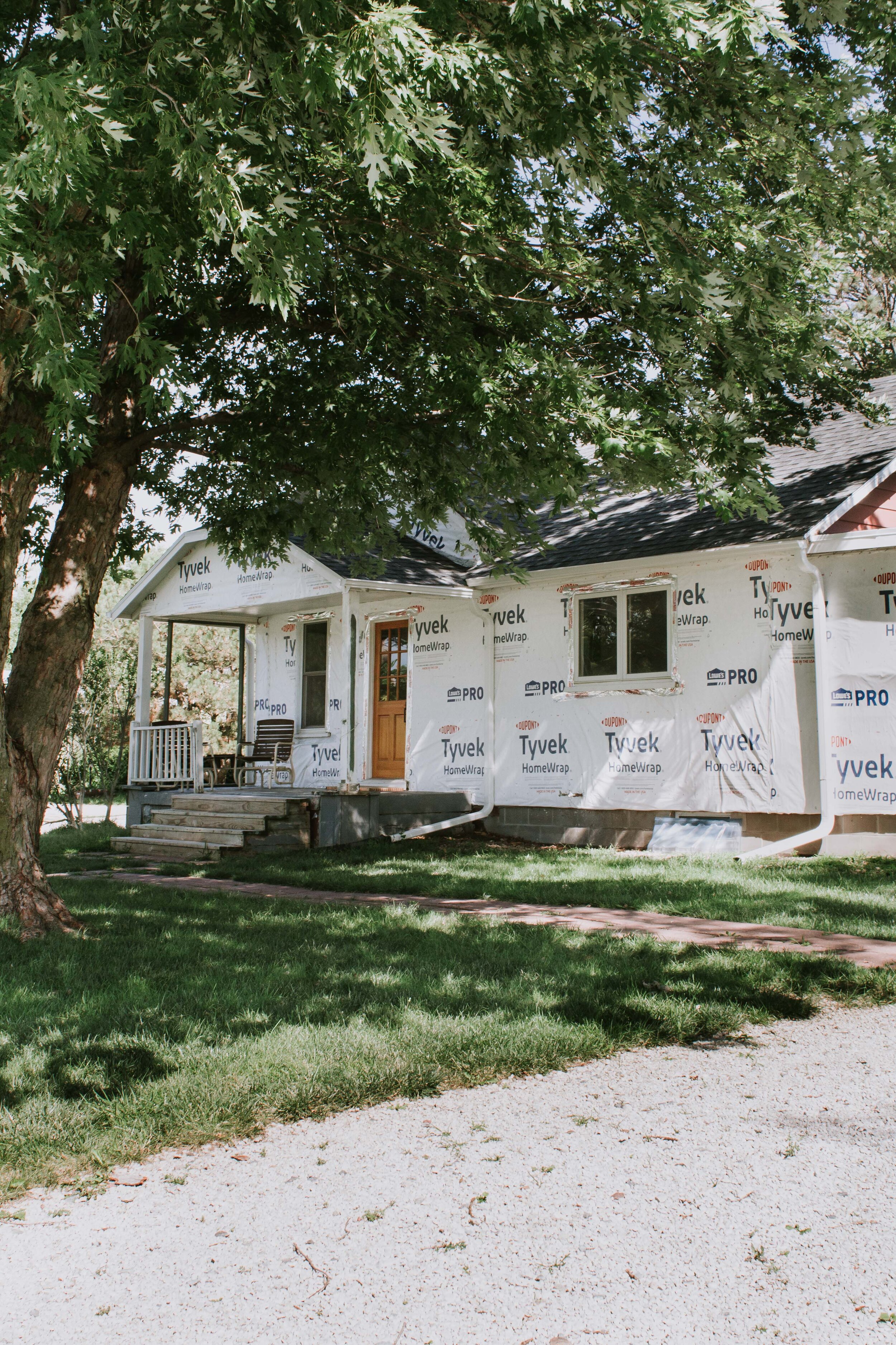 House exterior update: The old siding is gone and tyvek is on! Our siding game plan and the material we chose! | Nadine Stay