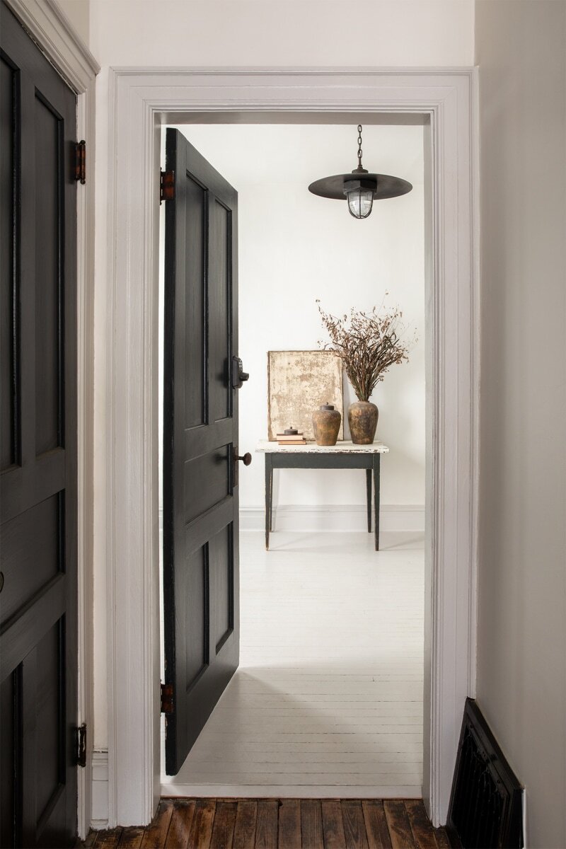 Notable Things: Black interior doors and restoring old homes. Photo by Zio and Sons via Domino | Nadine Stay
