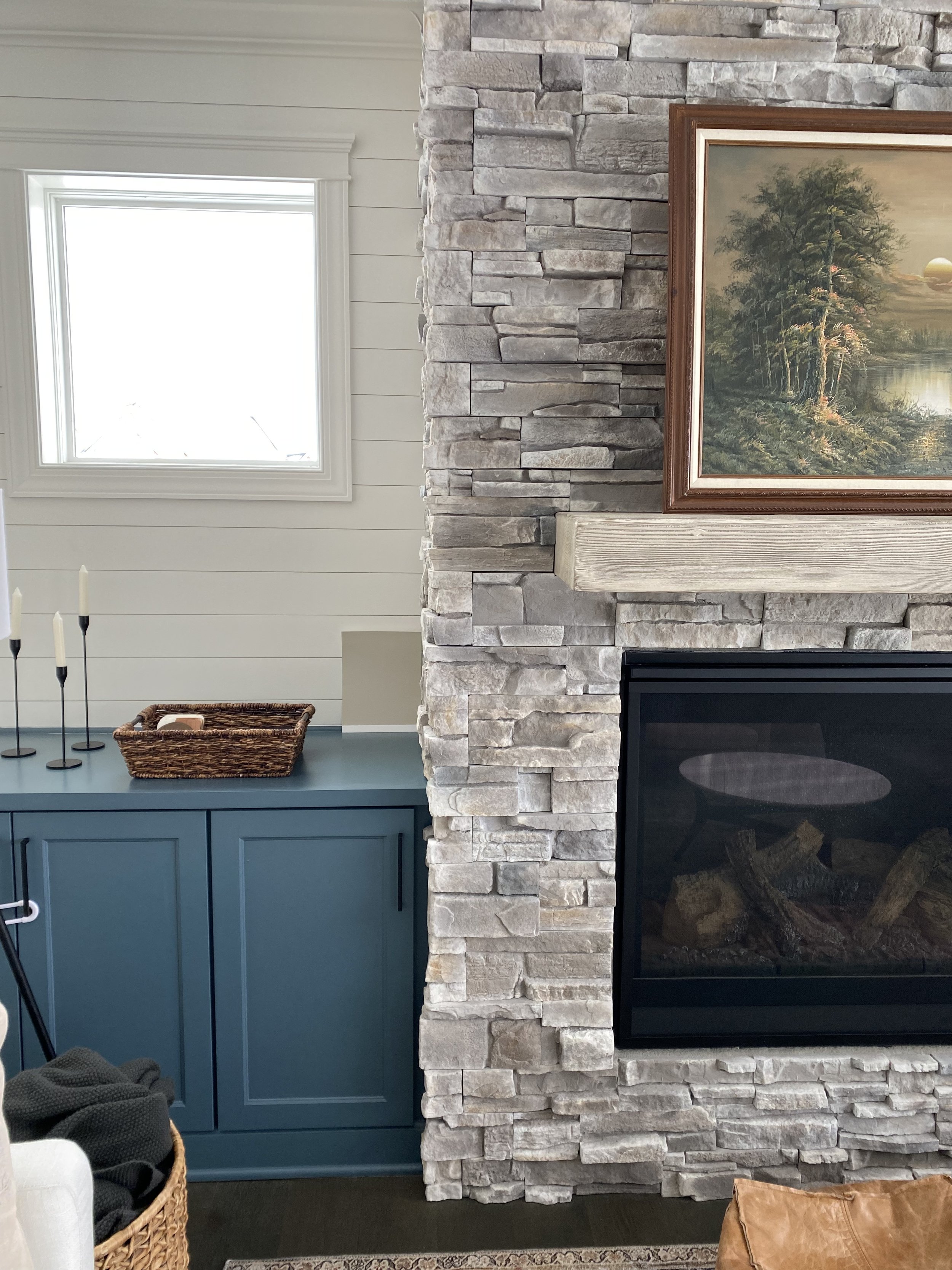 Dear Danica, why does my fireplace feel out of place and how can I make it stand out less? 3 reasons your stone or brick fireplace feels like it stands out and 1 solution that fixes it all. Stone fireplace makeover ideas. | Nadine Stay