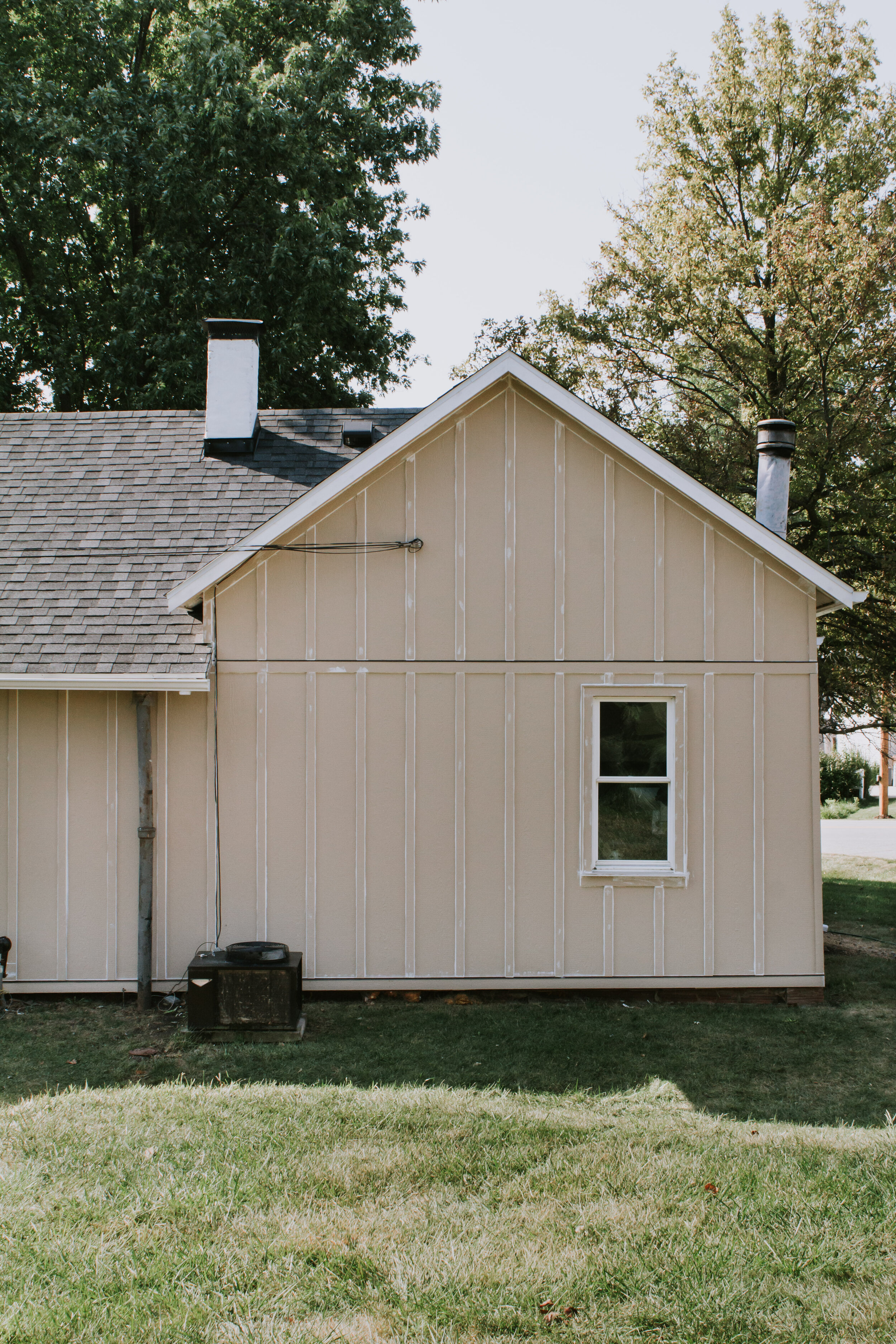 All the details on our board and batten siding. The style we chose, the material we chose, and where we bought it. Our honest opinion of LP SmartSide with info and specs. | Nadine Stay