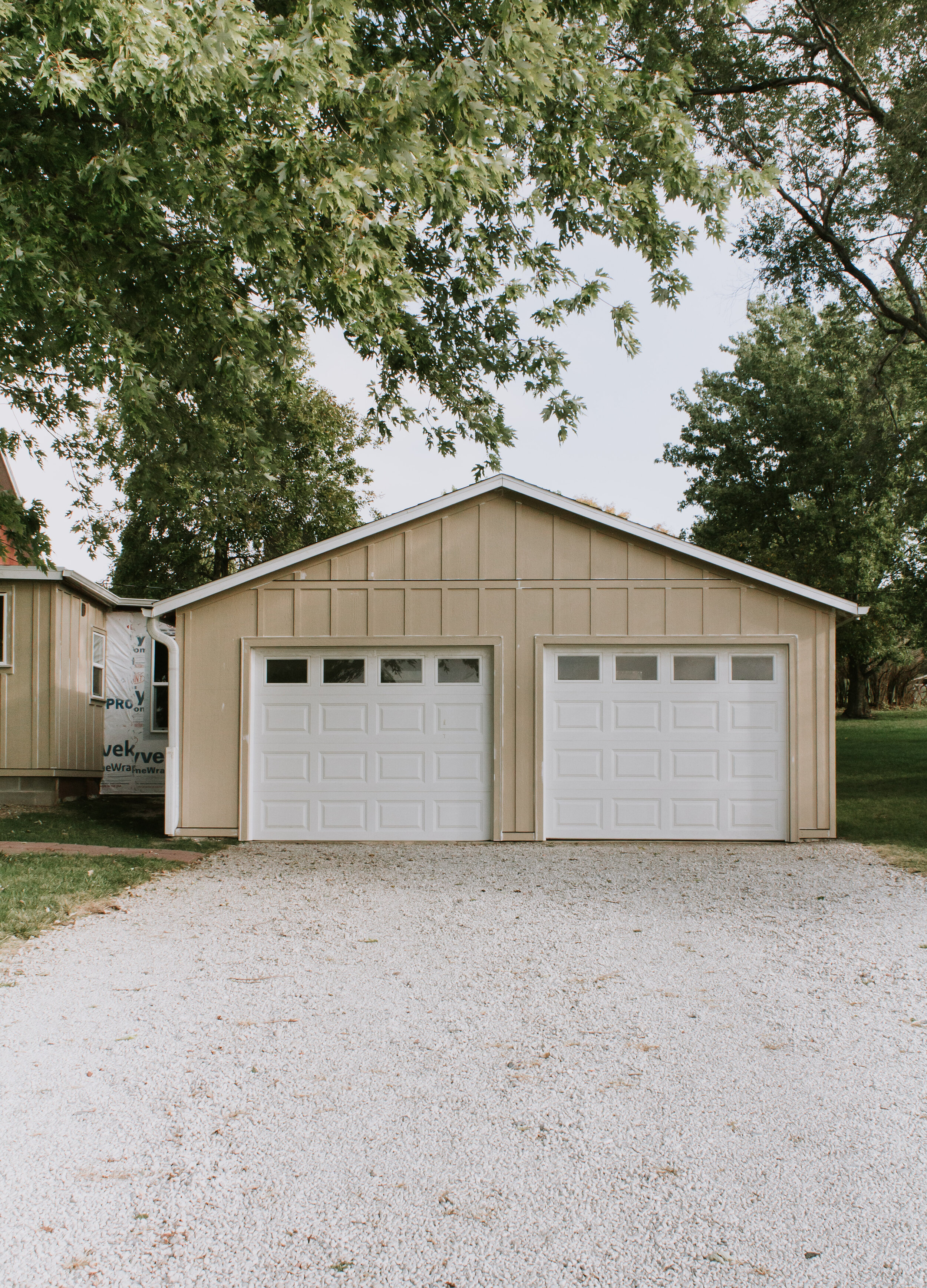 All the details on our board and batten siding. The style we chose, the material we chose, and where we bought it. Our honest opinion of LP SmartSide with info and specs. | Nadine Stay