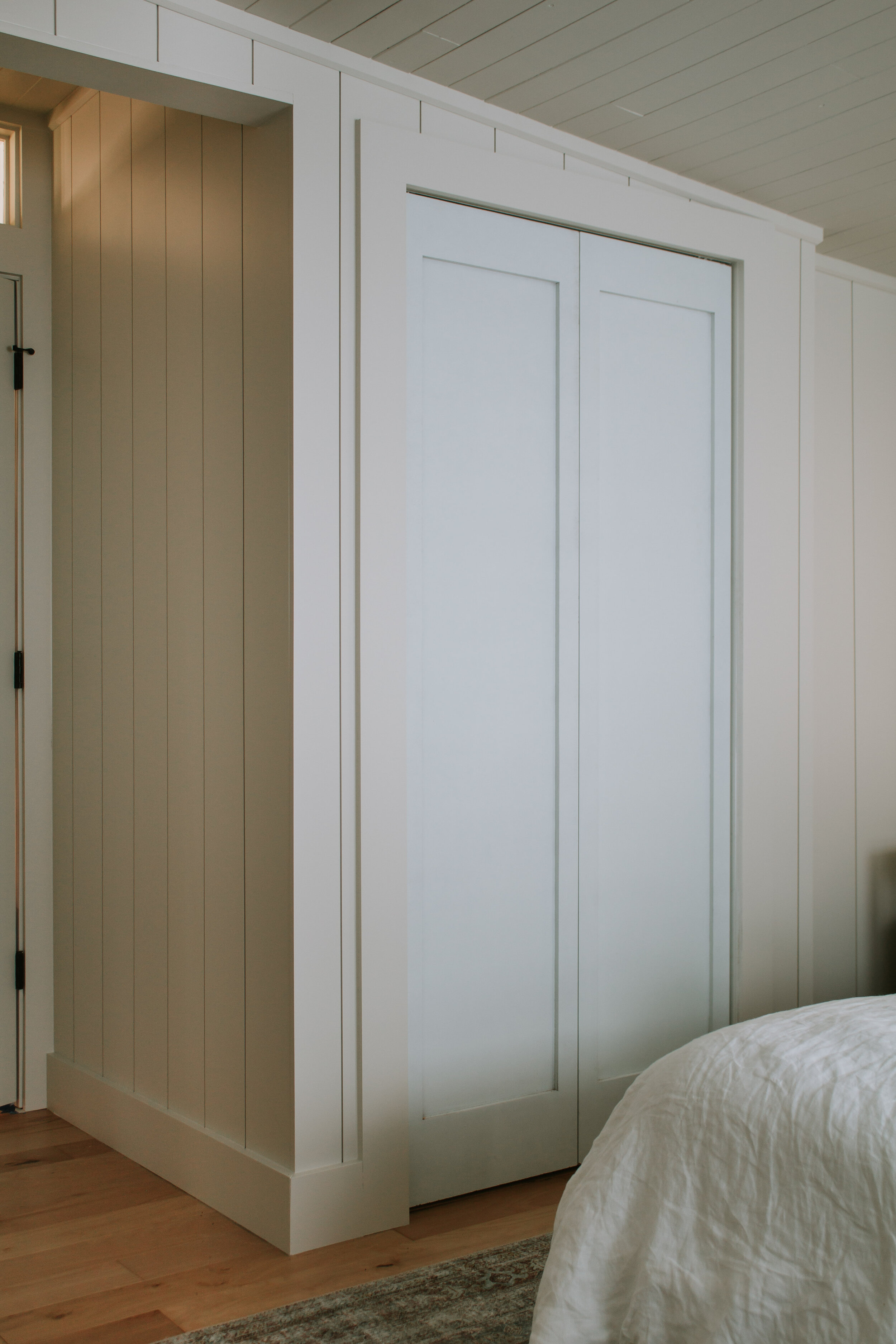 BEFORE | How we customized our standard bifold doors to look like high end double doors for less than $25. How to DIY and customize a single panel door with antique handles and knobs. Bedroom closet door inspiration. | Nadine Stay