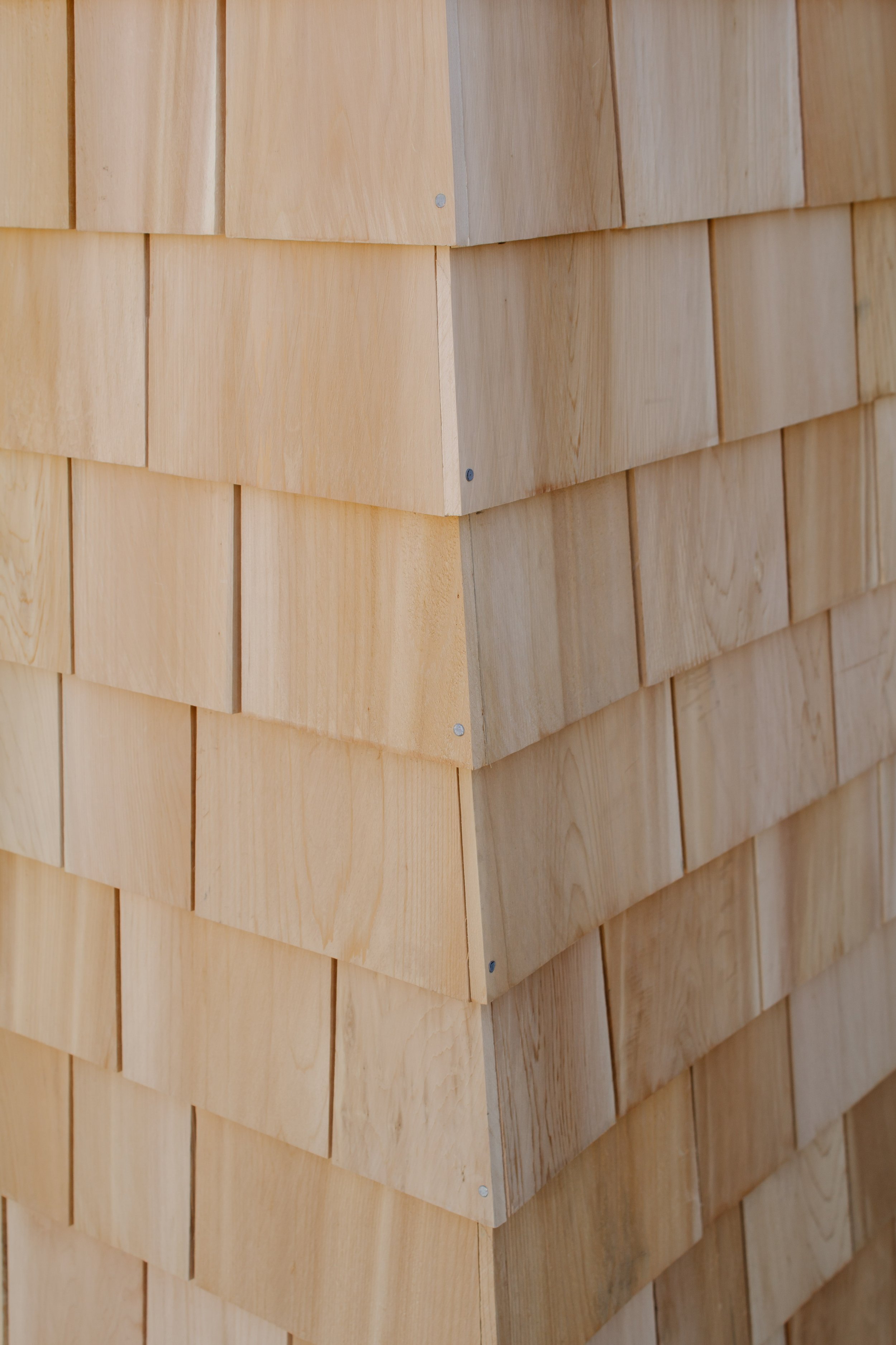 Cedar shingle install progress report. How to install cedar shingles for siding. Where to buy cedar shakes & shingles. Exterior siding project how to. Natural kiln dried cedar siding. | Nadine Stay