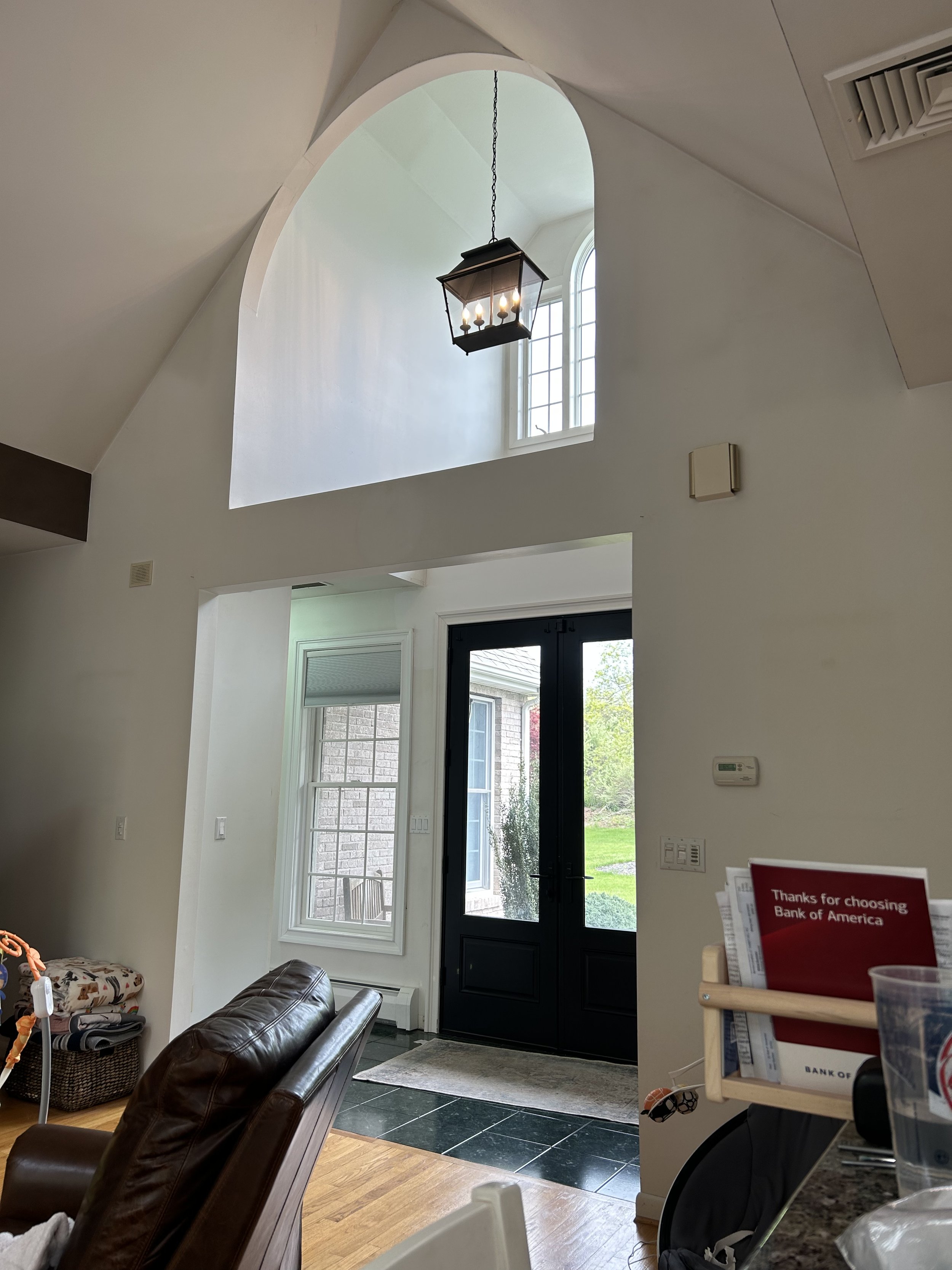 Dear Danica, how to design a foyer. Arched foyer. Ceiling pendant lantern. How to rework entryway.