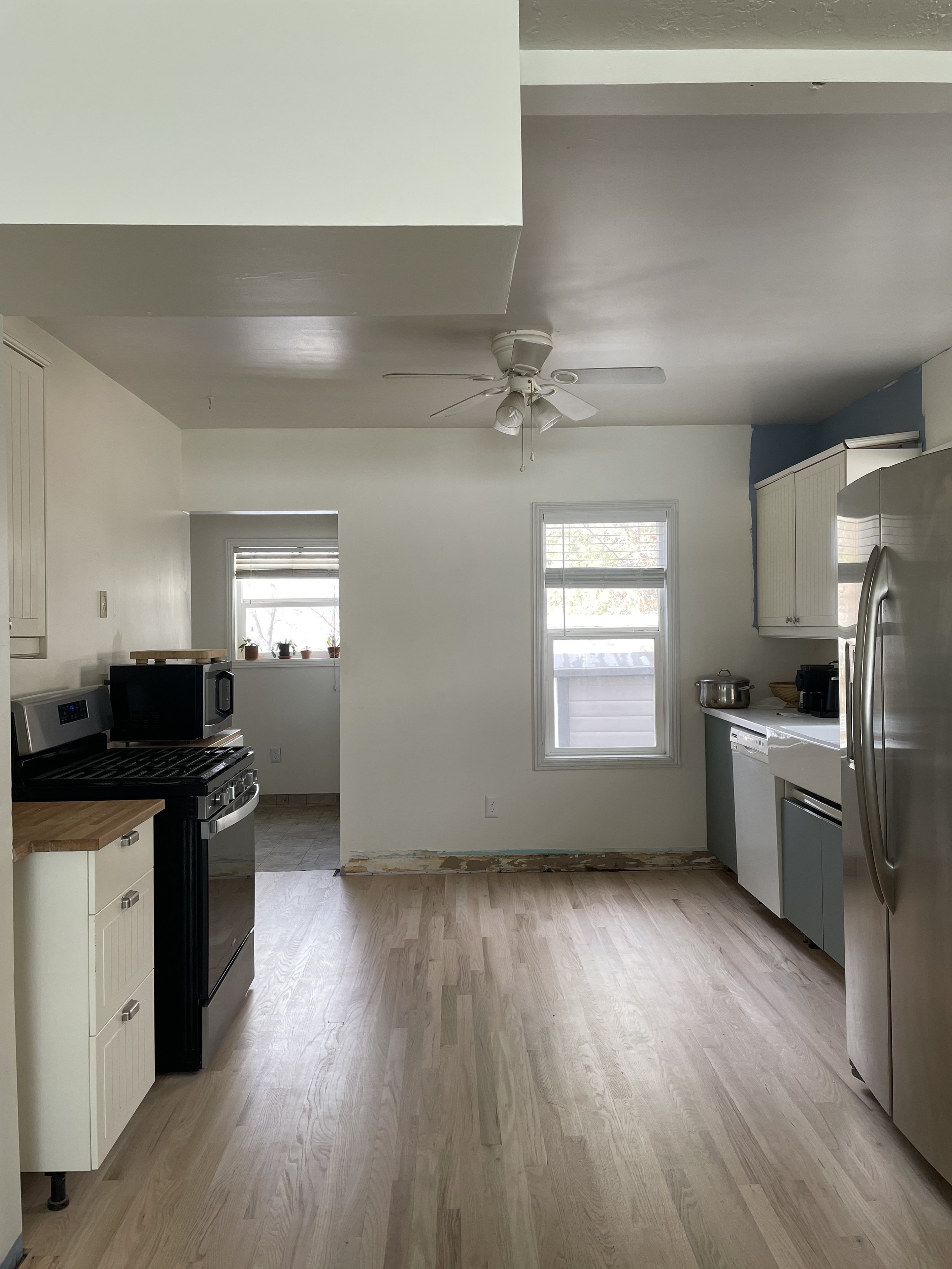 Dear Danica, Help! My galley kitchen feels lopsided. How to plan a galley kitchen renovation. Kitchen renovation must knows. Design tips for galley kitchen remodels. | Nadine Stay