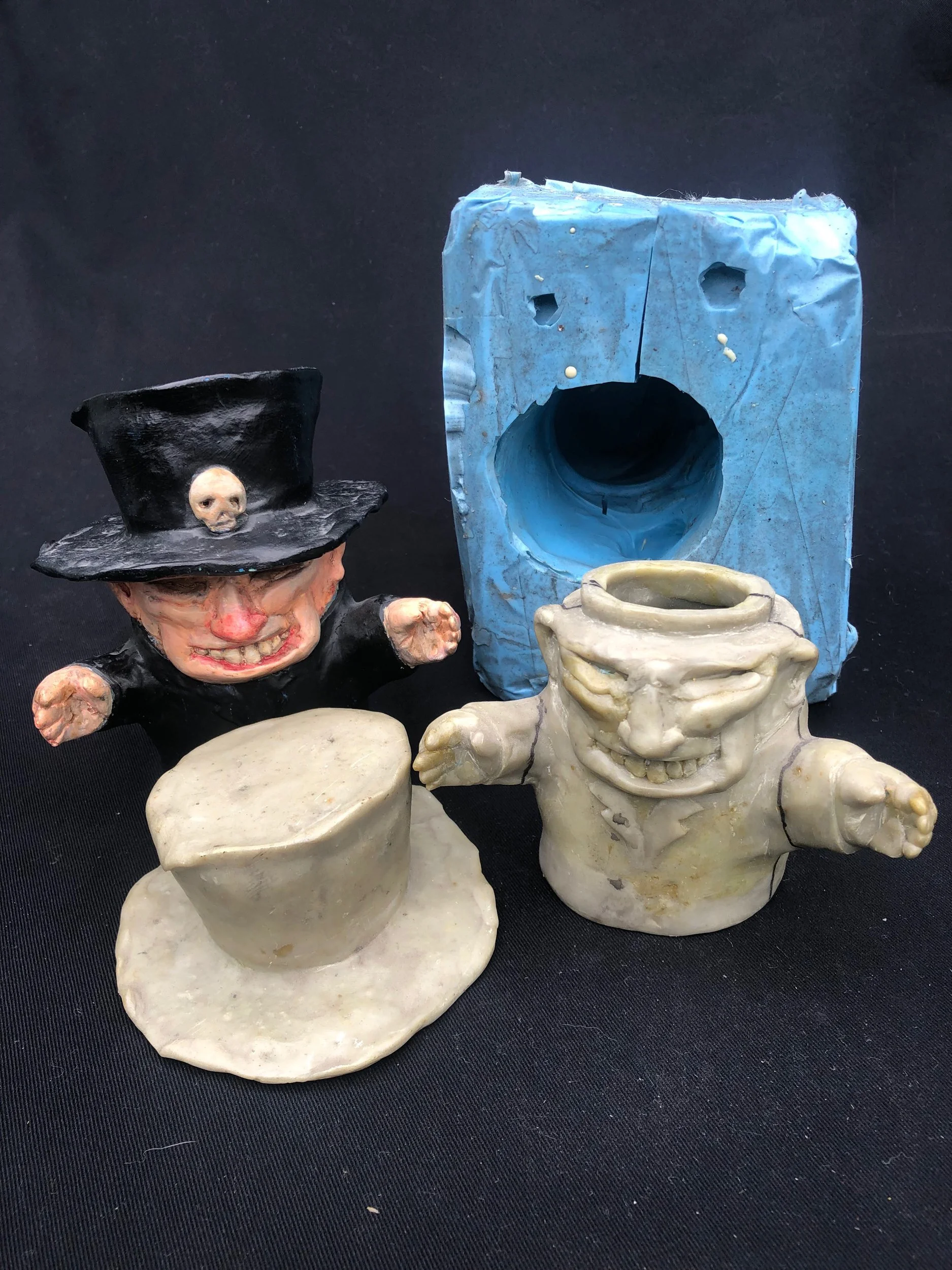  One part silicone mold from two part Apoxy Sculpt master. 