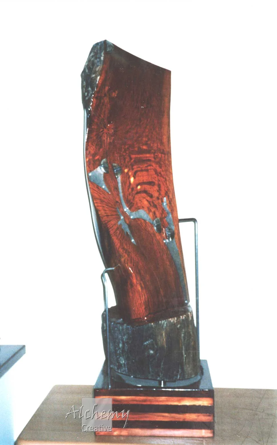 Twist  &nbsp; &nbsp; &nbsp; &nbsp; &nbsp; 2004 &nbsp; &nbsp; &nbsp; &nbsp; &nbsp; &nbsp;Height: 900mm &nbsp; &nbsp; &nbsp; &nbsp; &nbsp; &nbsp; &nbsp;Jarrah form with stainless steel features on laminated timber base