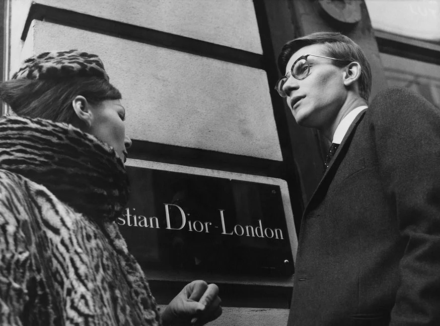 Yves Saint Laurent in front of Christian Dior London, 11th November 1958 © Popperfoto/Getty Images