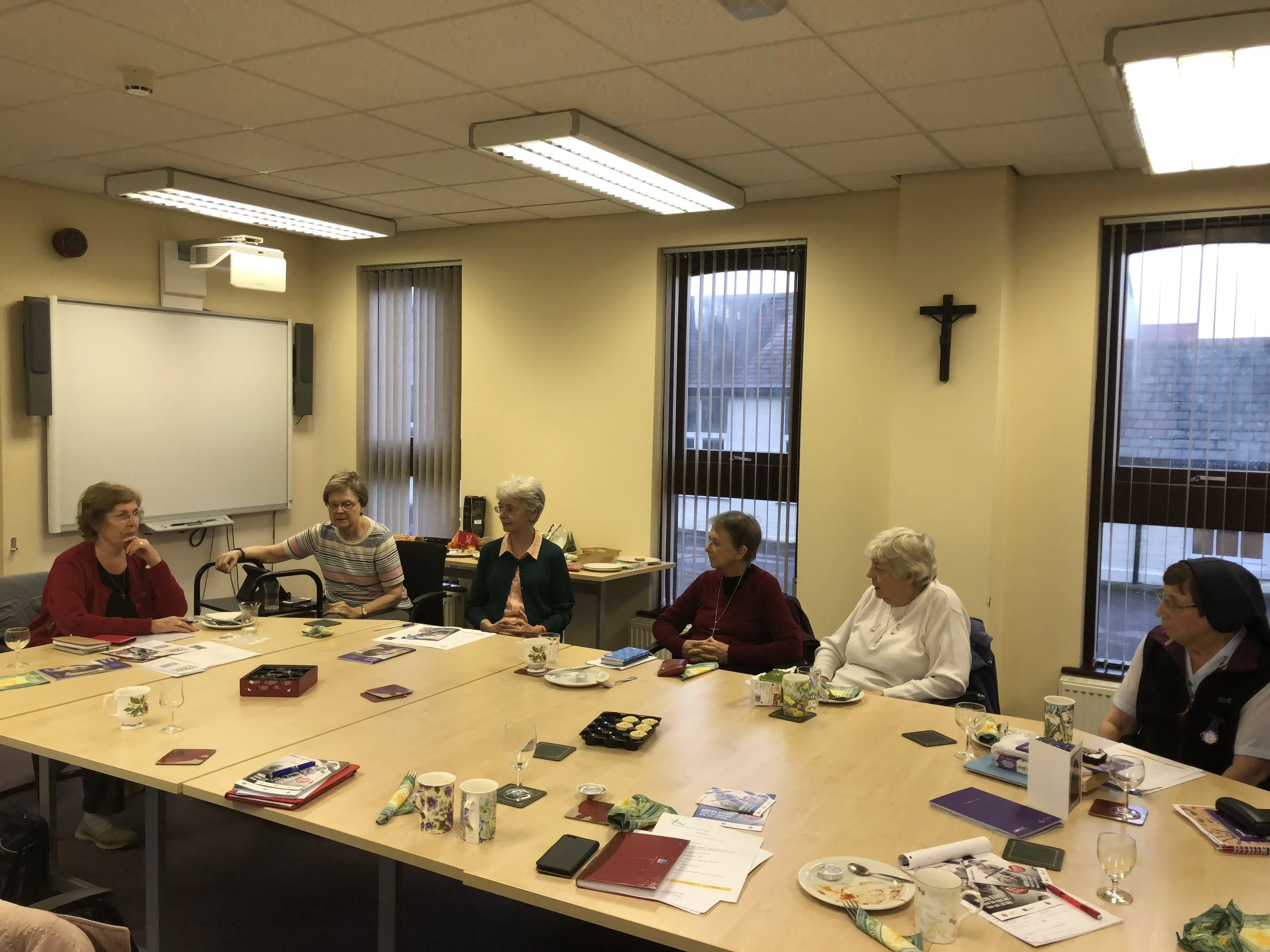 Sister Marie, far left & Sister Isabel, far right at a TRAC meeting