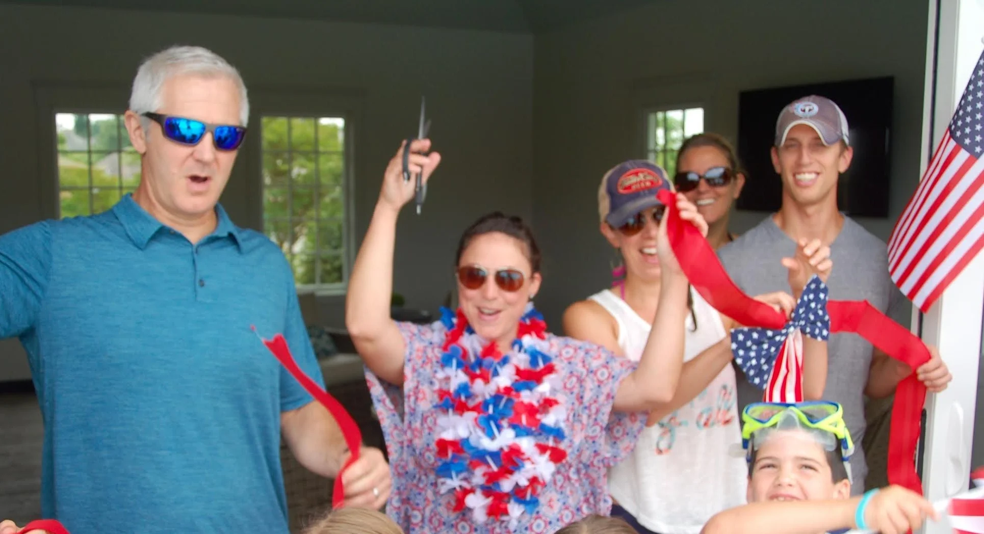 Pictured from left to right are Board members Mike Klein, Amy Silvers, Chrissy Gstell and homeowners, Travis and Jessica Konemann.