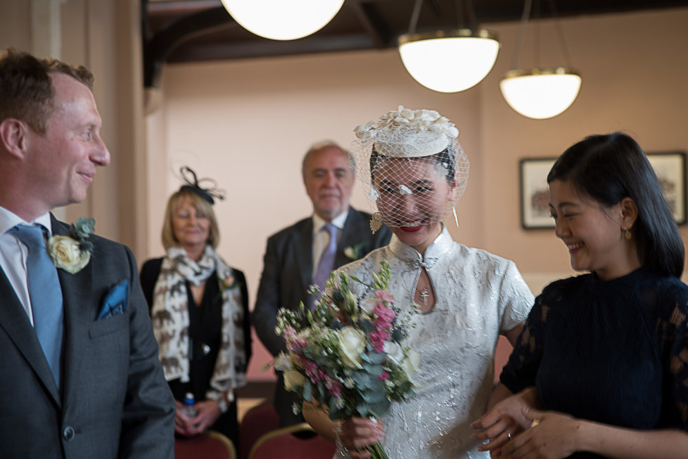 Asian bride walks down the aisle