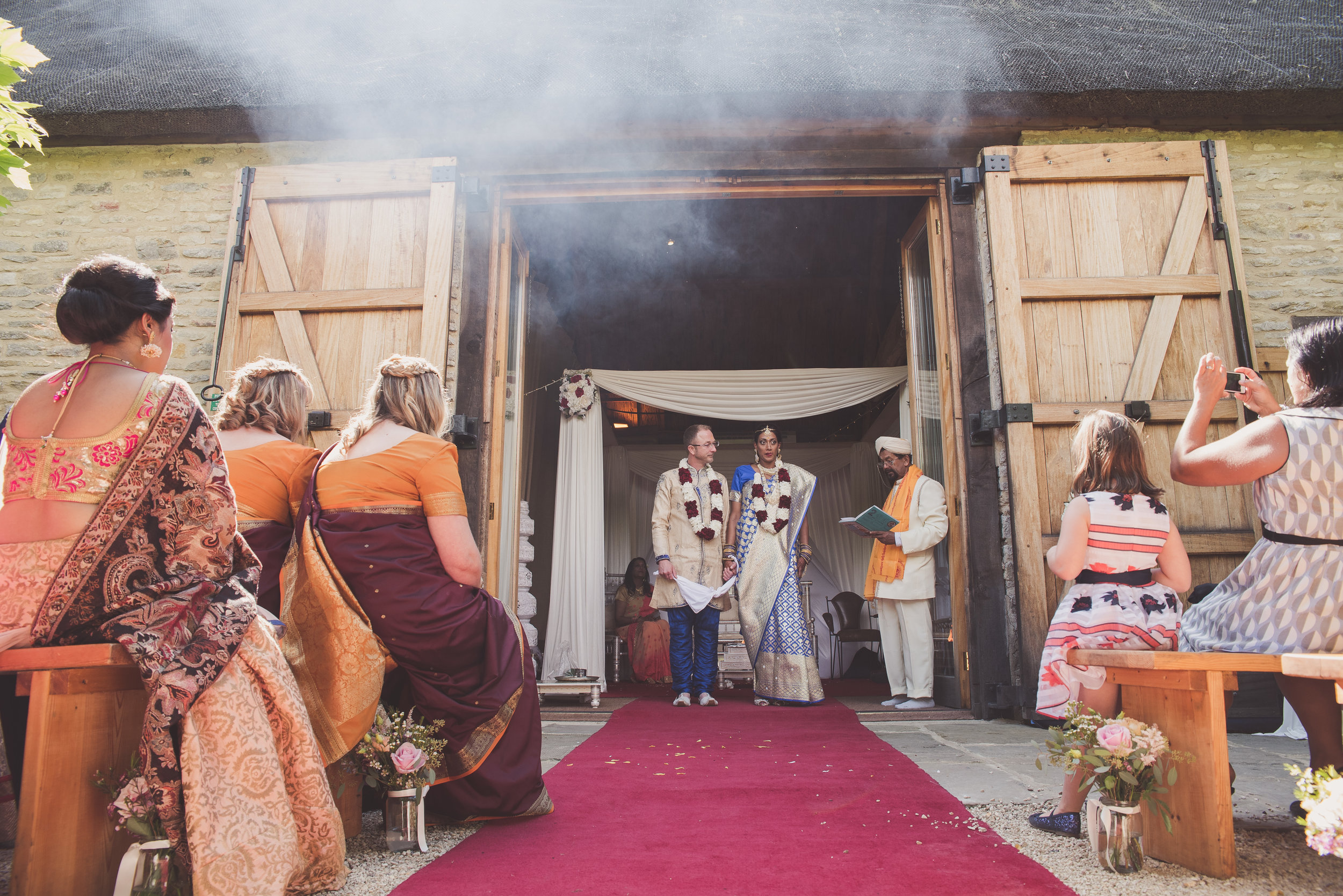 Hindu bride and groom under mandap at Hindu wedding ceremony