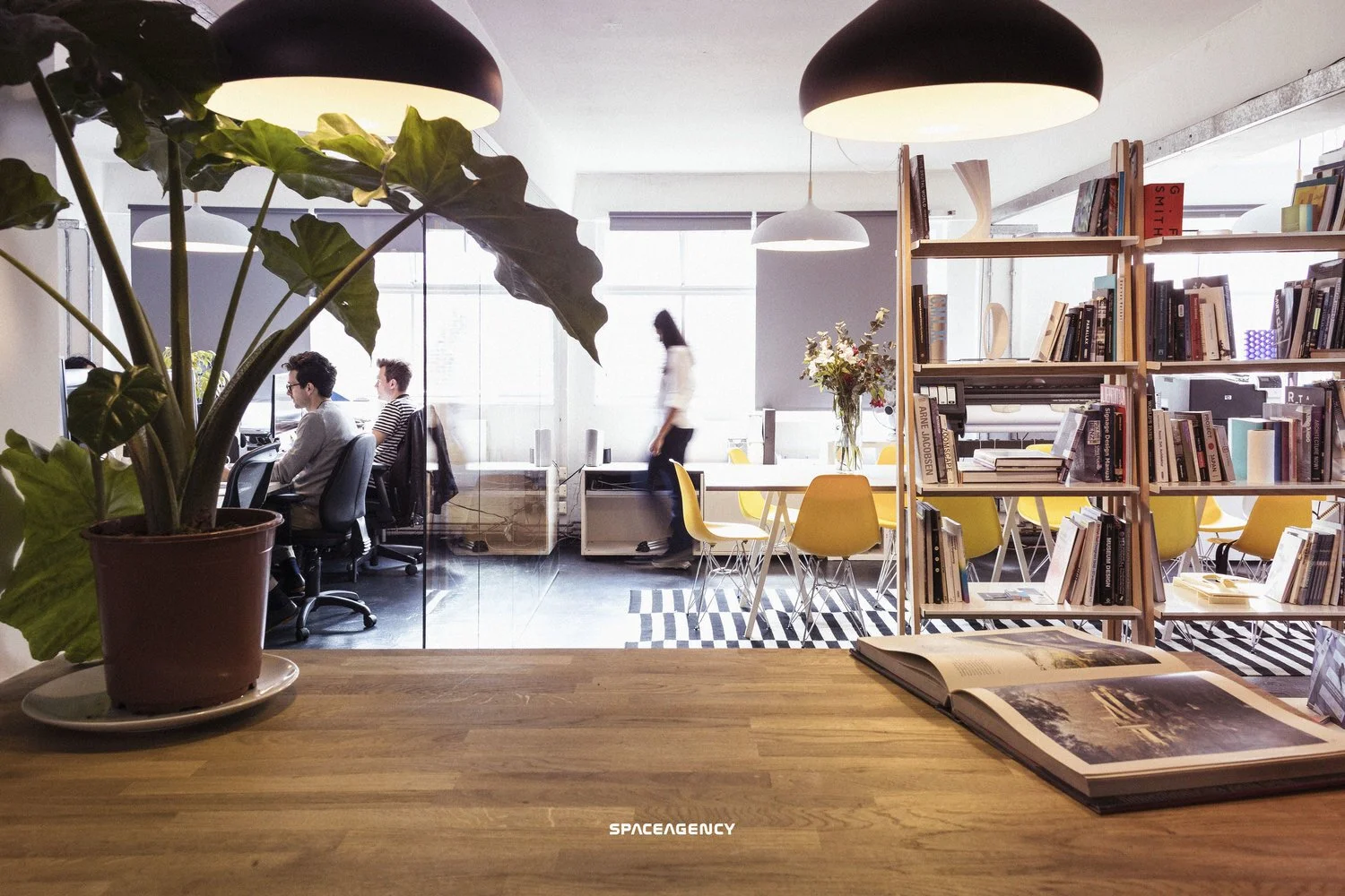 Spaceagency London studio interior with team members working in the office.