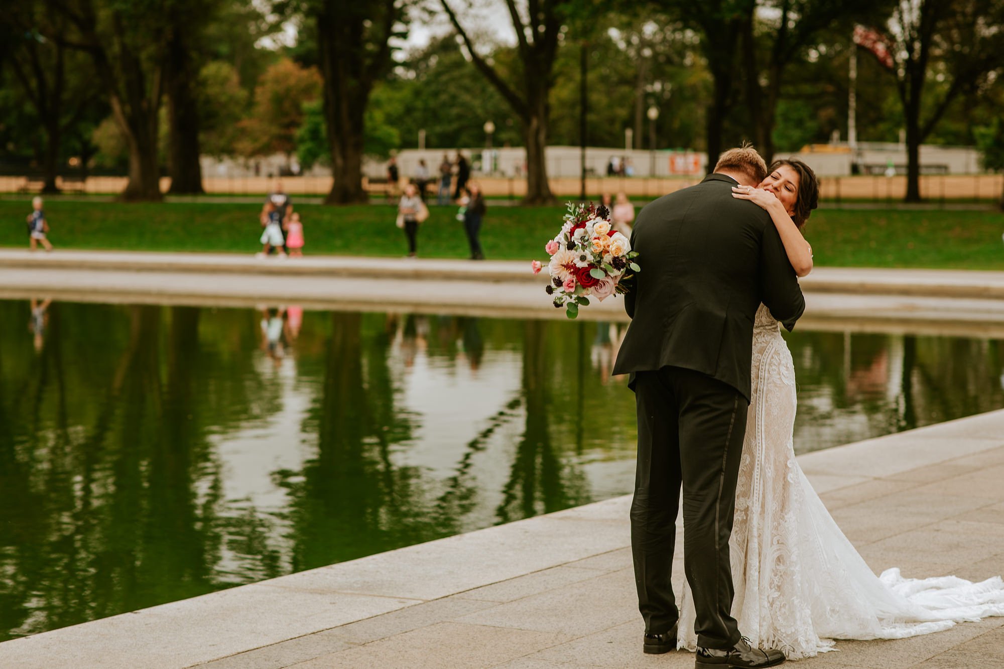 First look embrace at the Lincoln Memorial