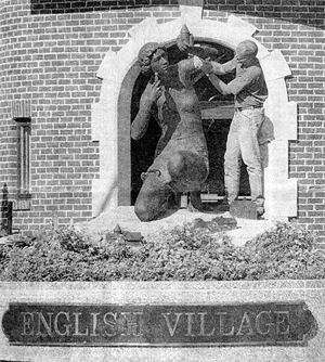 DESIGNING WOMAN sculpture meant to define english village
