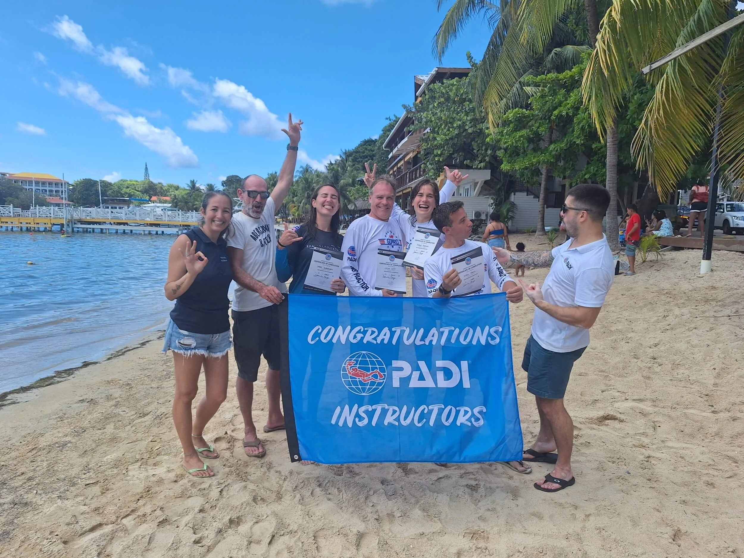 New PADI Instructors celebrate passing the Instructor exam