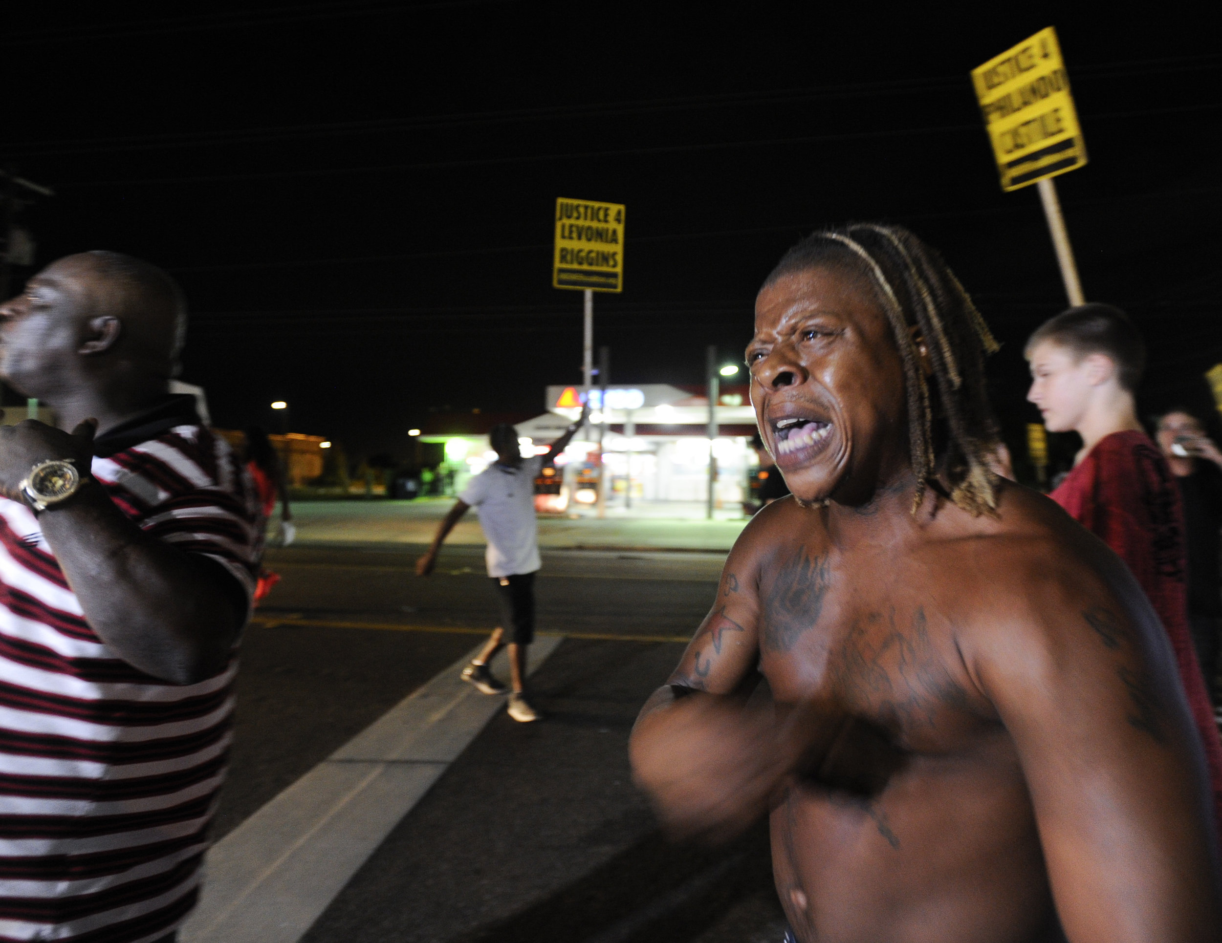  Darrell Judkins, a 29-year-old from Tampa, yells to the crowd during a gathering outside the Get N Go convenience store on South 78th Street in Tampa protesting the death of Levonia Riggins, a 22-year-old who was shot by a Hillsborough County Sherif