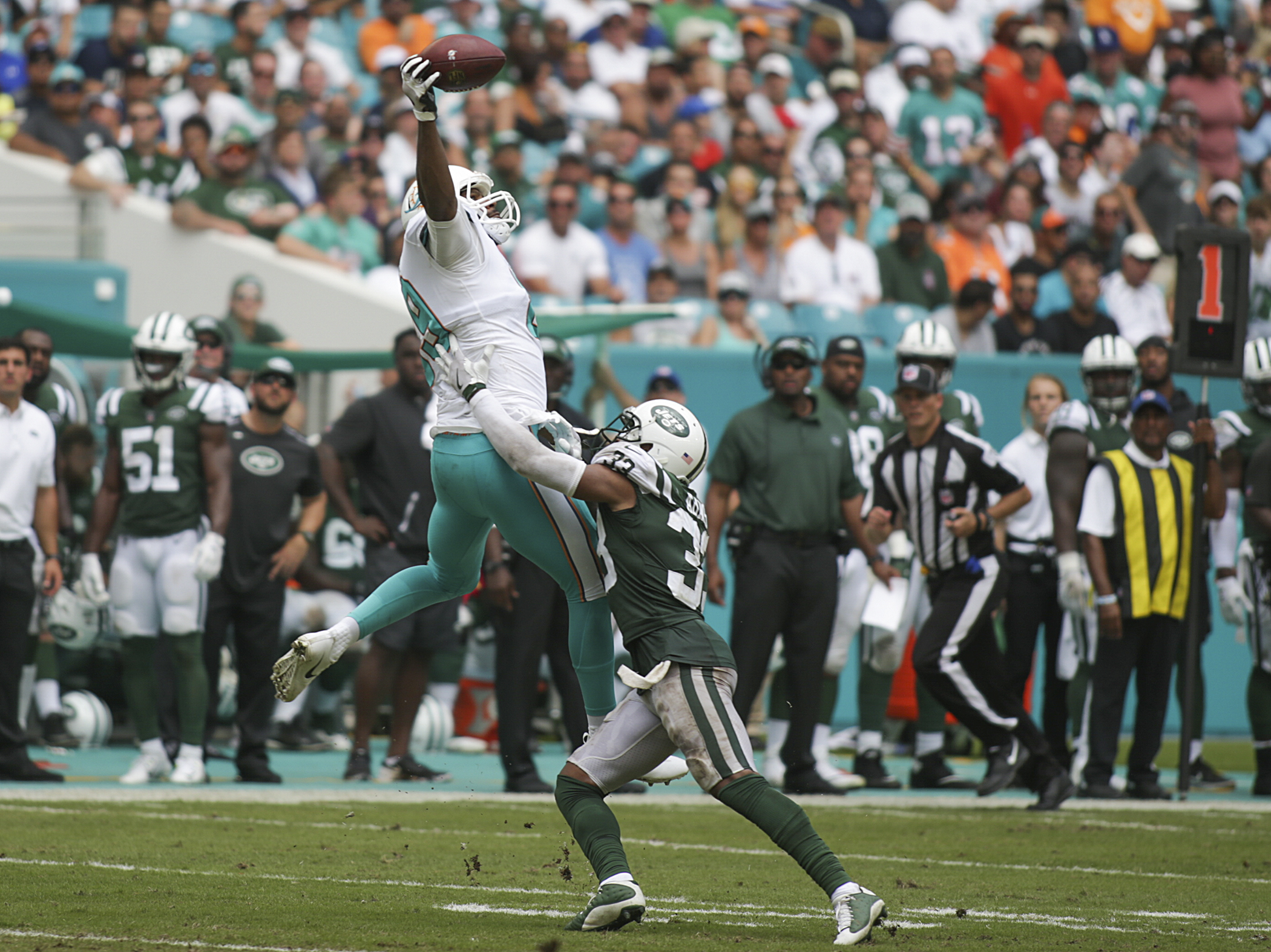  Miami Dolphins tight end Julius Thomas (89) makes a 20-yard first-down reception over New York Jets strong safety Jamal Adams (33) in the third quarter at Hard Rock Stadium in Miami Gardens, FL. Final score: Miami Dolphins 31, New York Jets 28. 