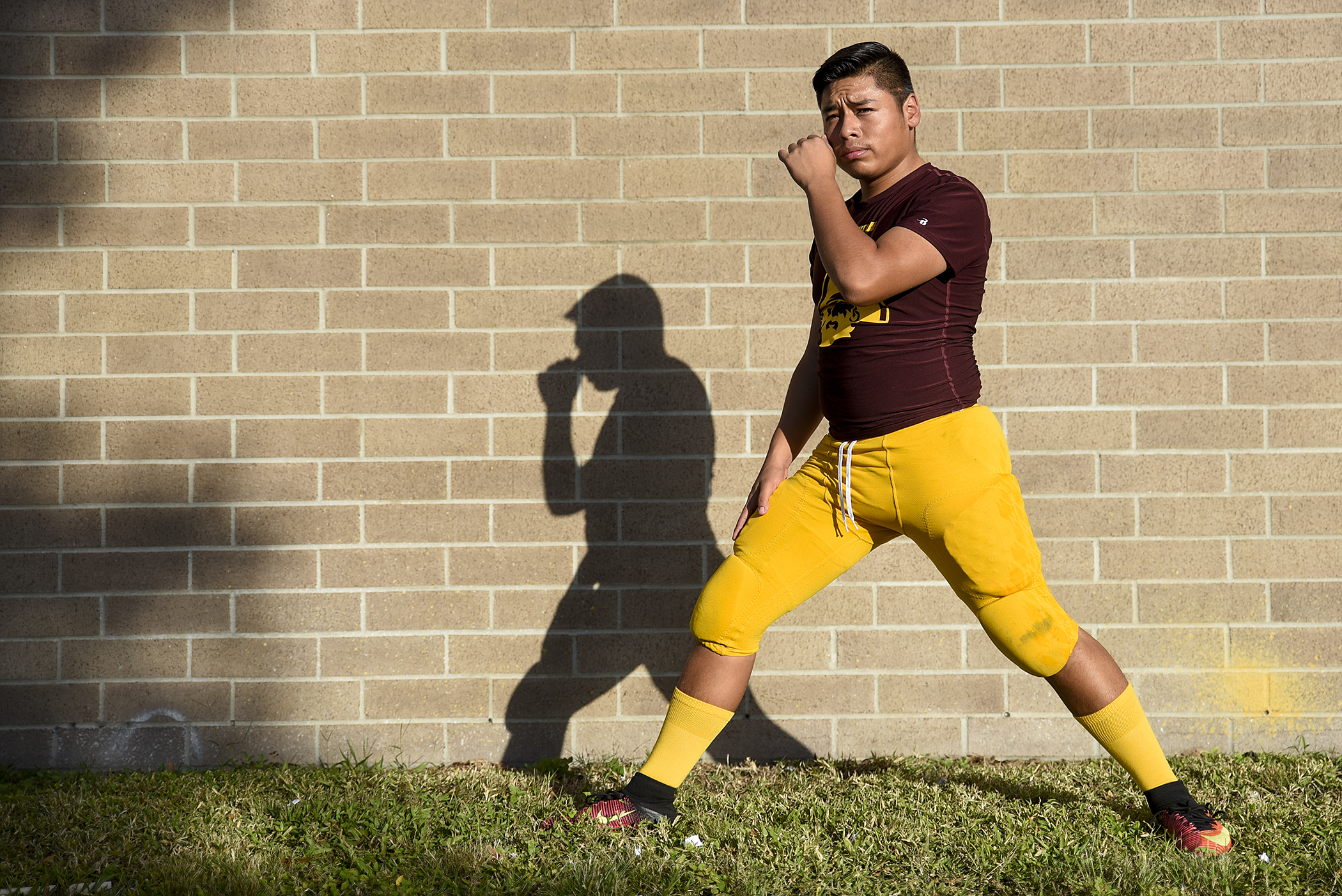  Glades Central kicker Gregorio Gomez (40) stretches before the game between Pahokee and Glades Central at Glades Central. 