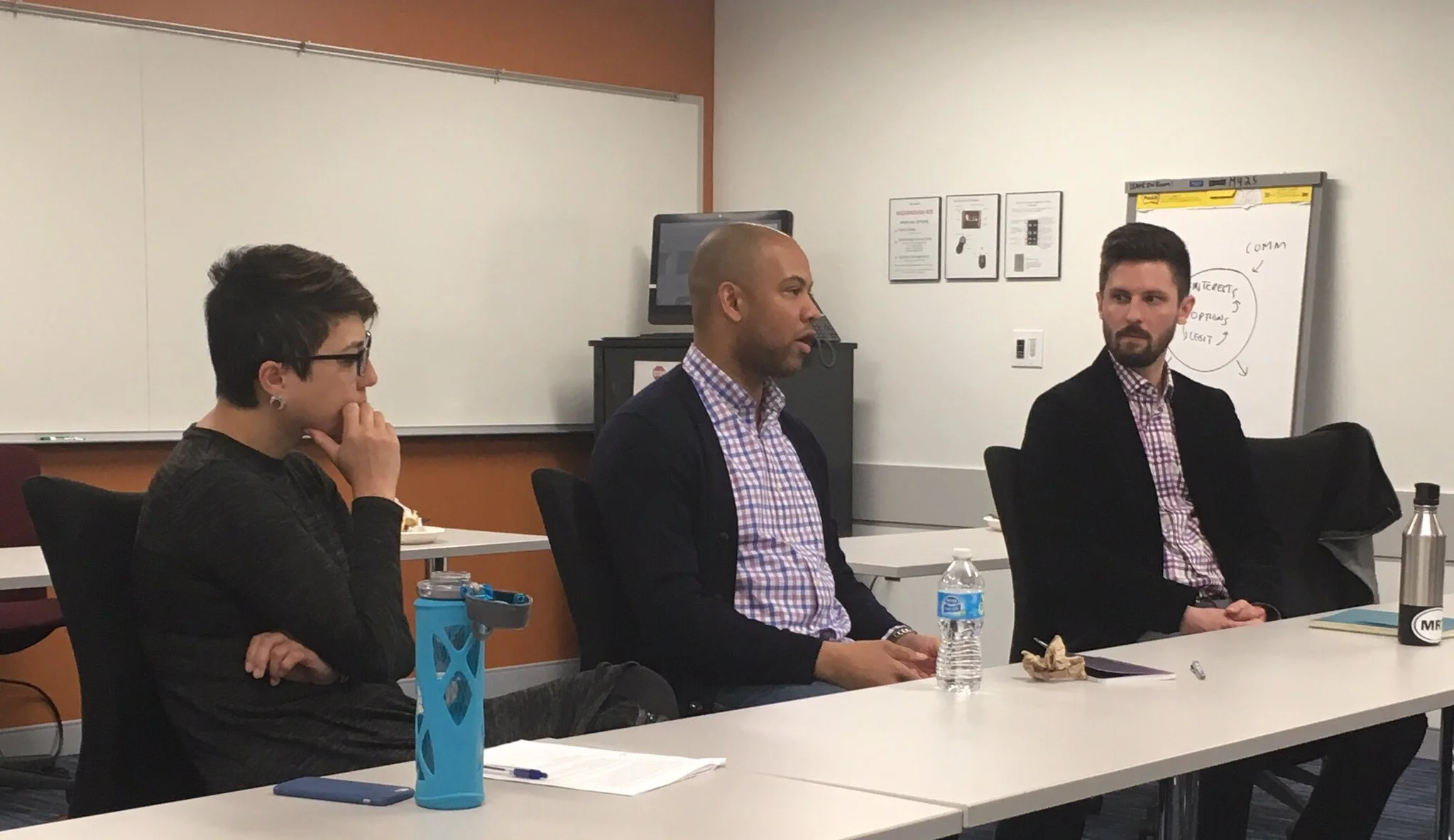 From left: Georgetown's Laura Moy, Dr. Clarence Wardell III and Jason Tashea discuss the use of technology in the criminal justice system.