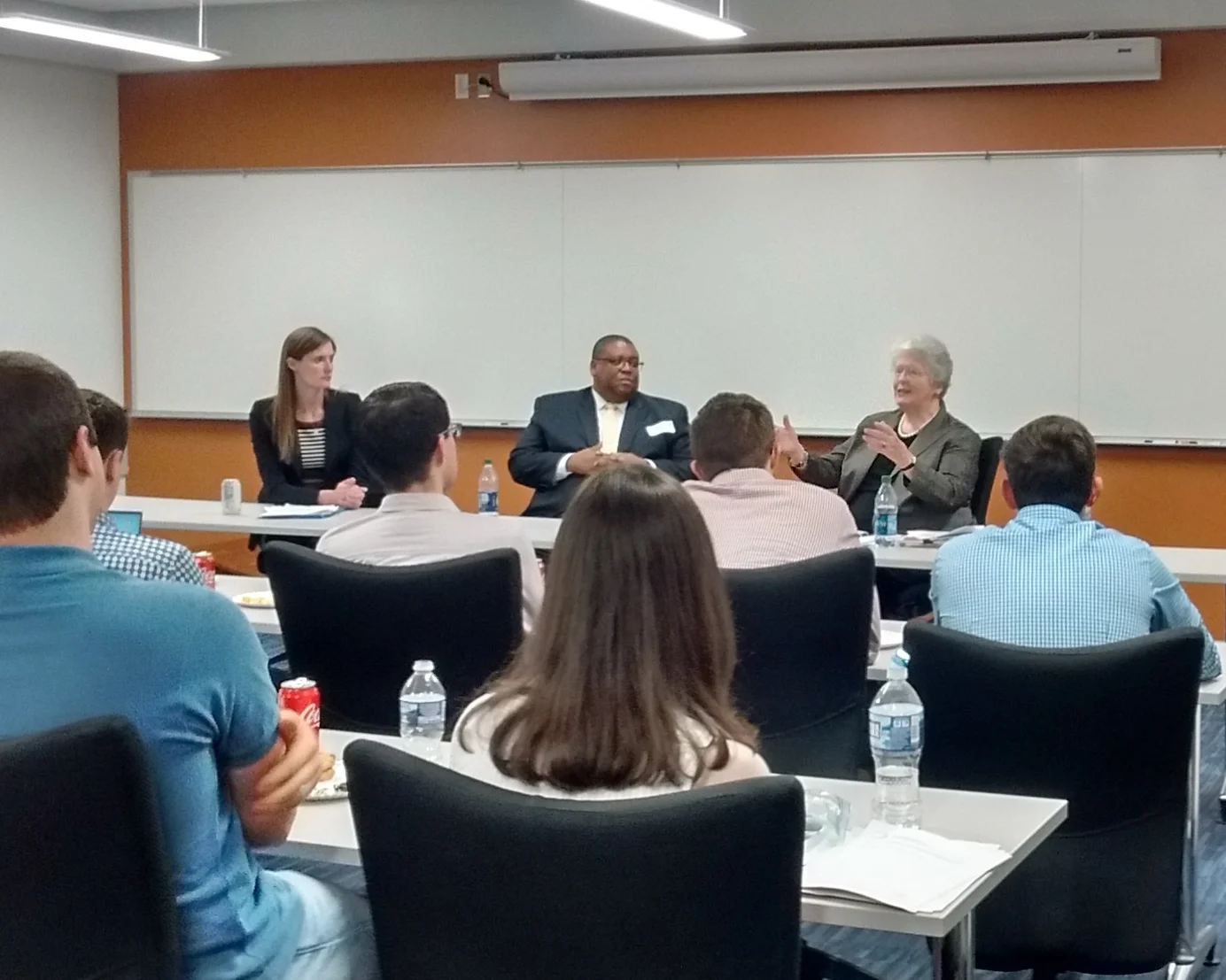 Institute Director Alex Givens (L) moderates a discussion with The Hon. David Strickland (C) and The Hon. Joan Claybrook (R), two former Administrators of the National Highway Traffic Safety Administration.