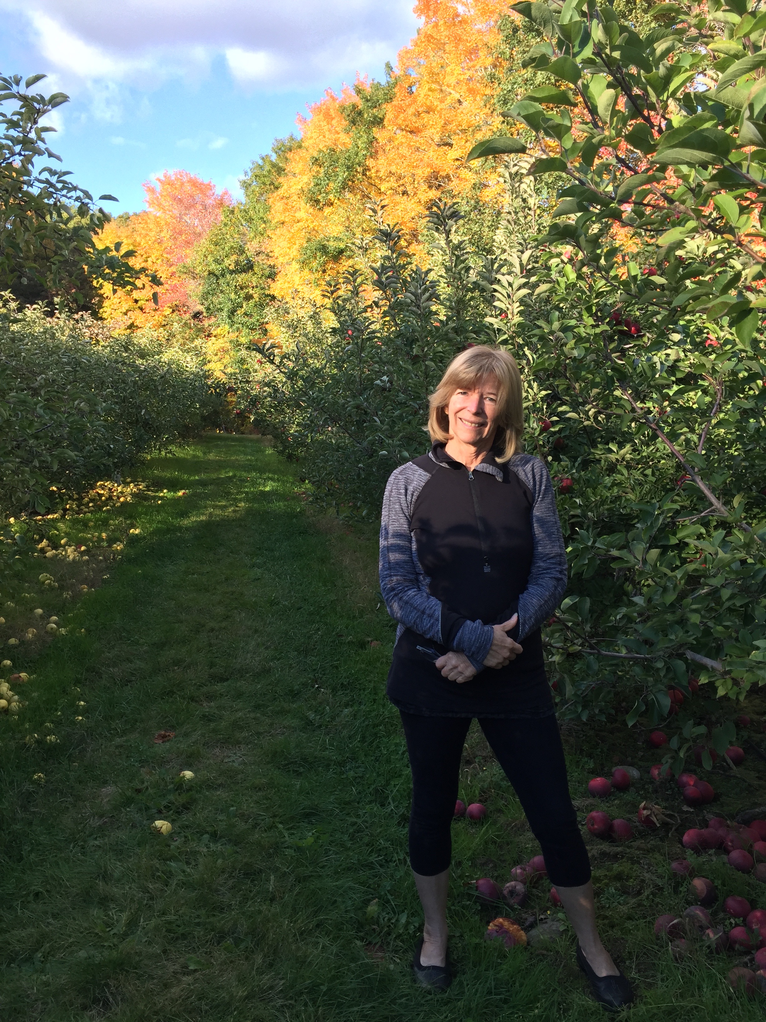 Enjoying a beautiful fall day at an apple orchard