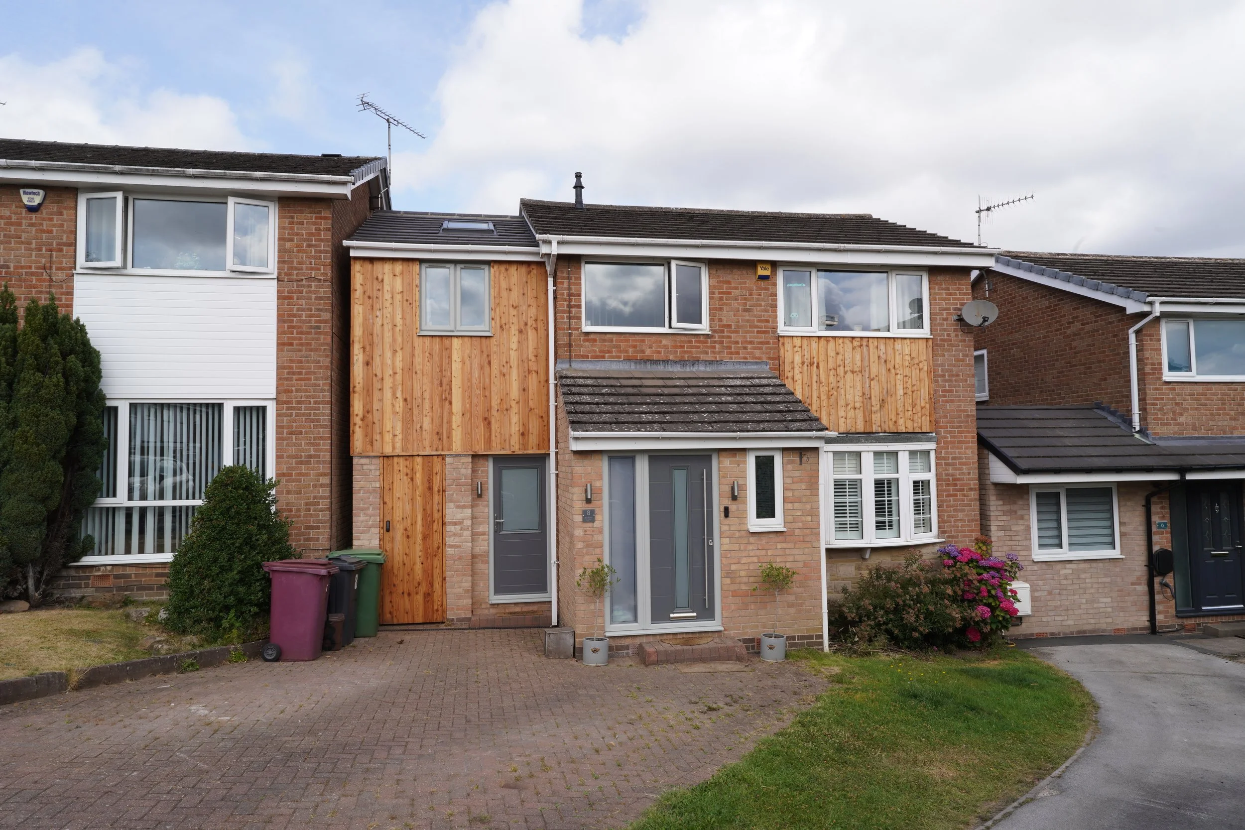two storey side extension in Dronfield, Sheffield; timber cladding and brick finish