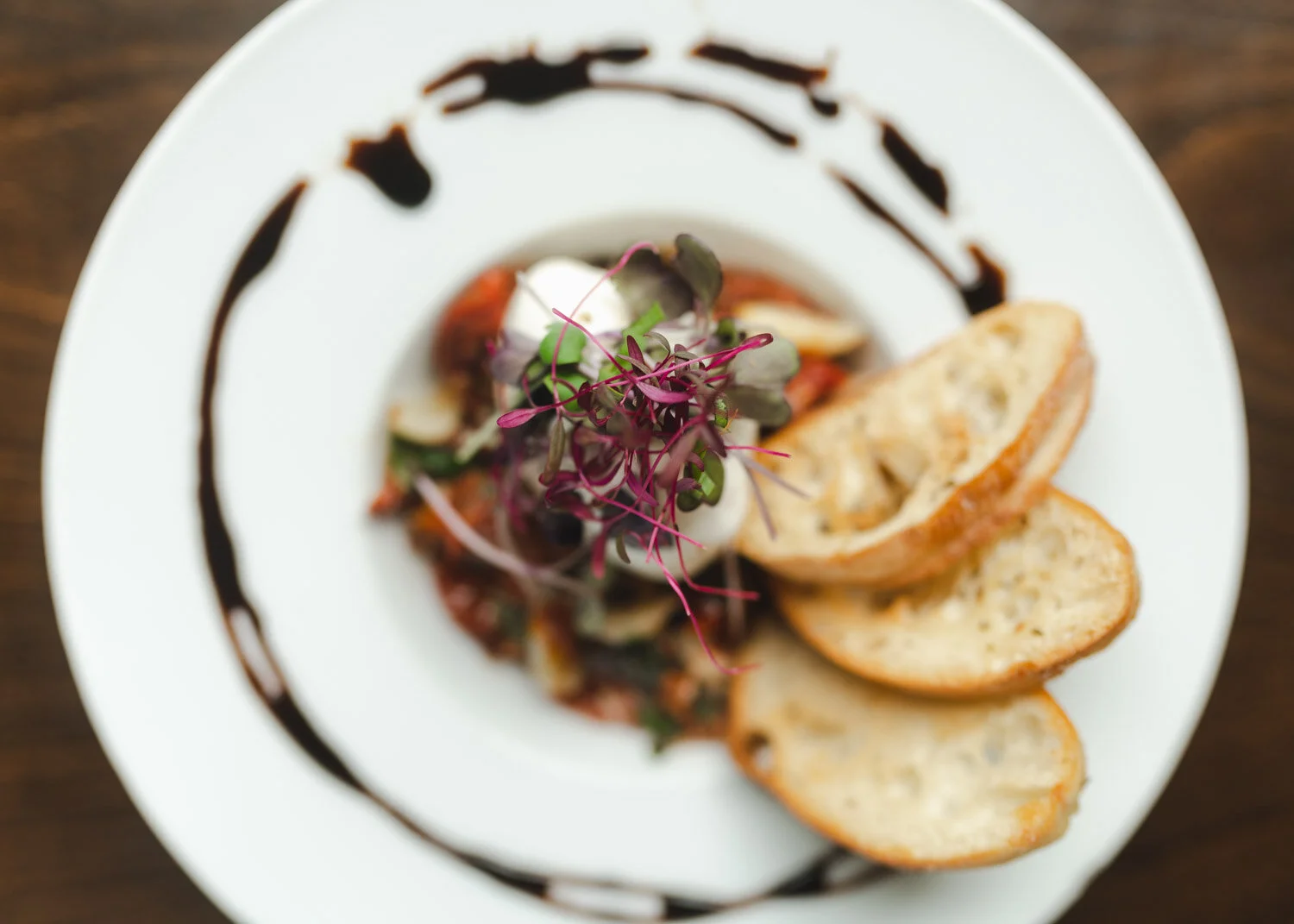 Garnish detail with micro greens, crostini and balsamic reduction (Copy)