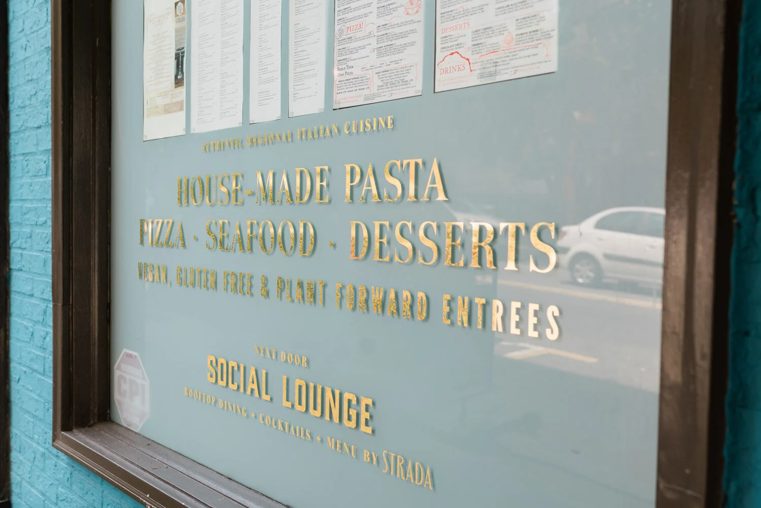 window lettering of Italian restaurant in downtown Asheville (Copy)
