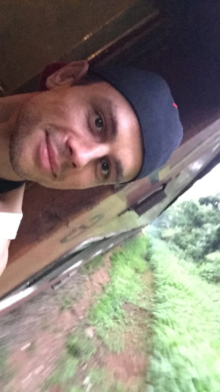 Trying to nail a 'hanging-outside-a-train' selfie without getting spat on. Easier said than done.