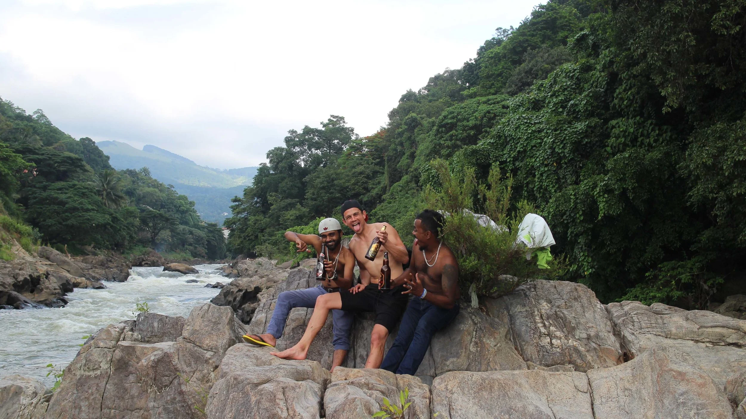 Saapu, Me &amp; Chana drinking by a river somewhere in Kandy.