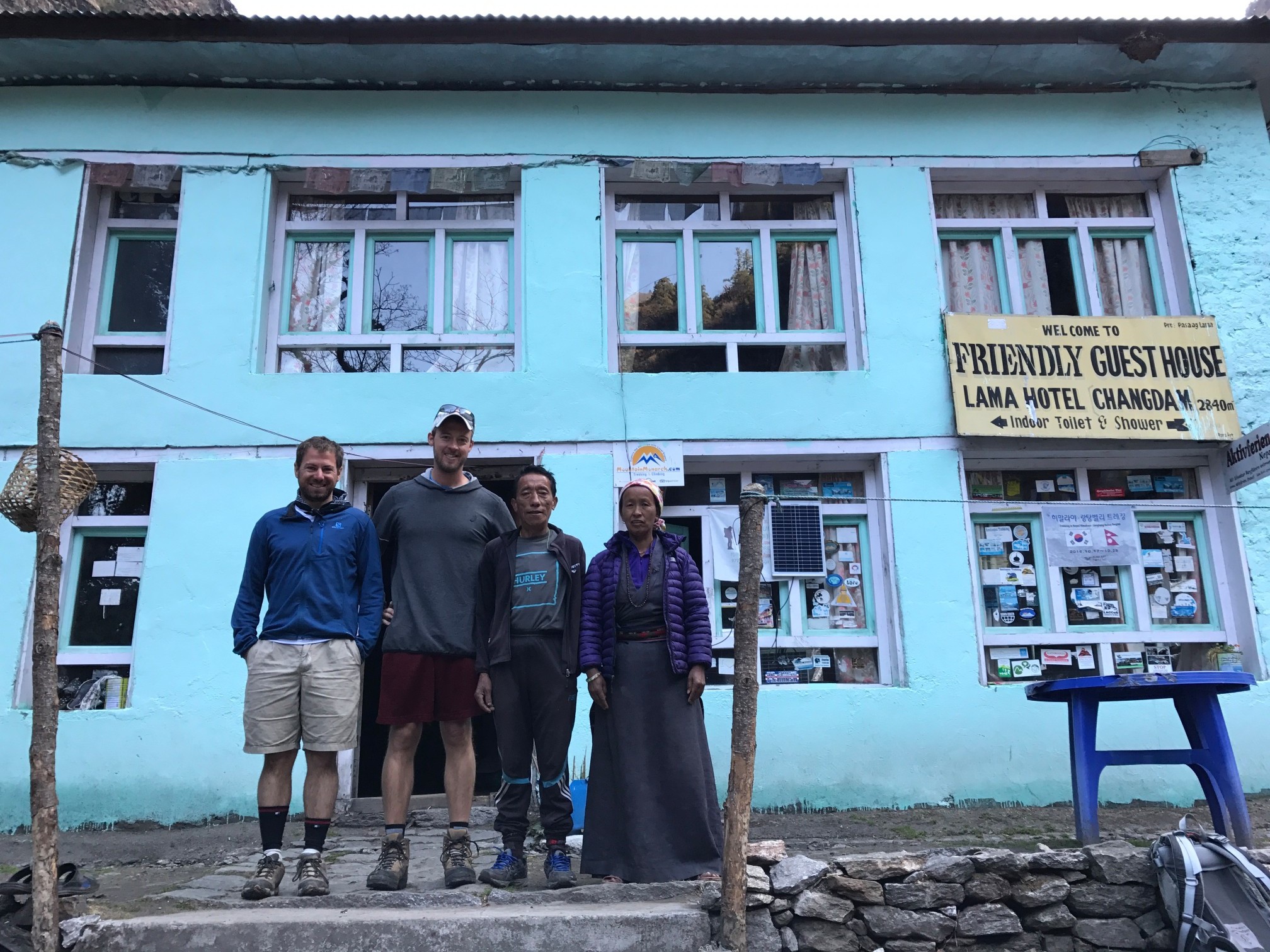 Kevin and I with Friendly Guest House owners