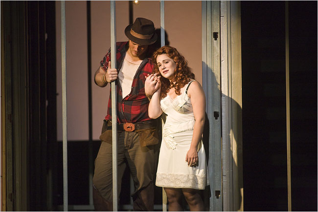 Rebecca Jo Loeb and Steven Ebel in a scene from Rise and Fall of the City of Mahagonny at Tanglewood . Photo by Michael J. Lutch for The New York Times .