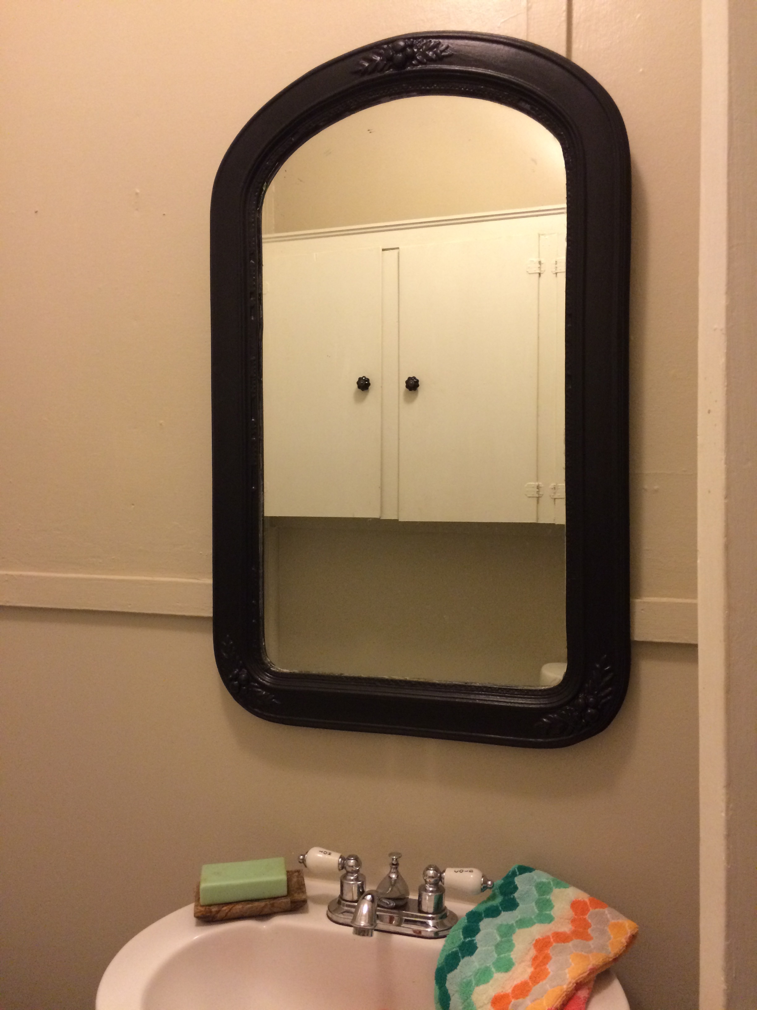 The black changed the whole look of the mirror and really made the "hot" and "cold" stand out on our faucet!