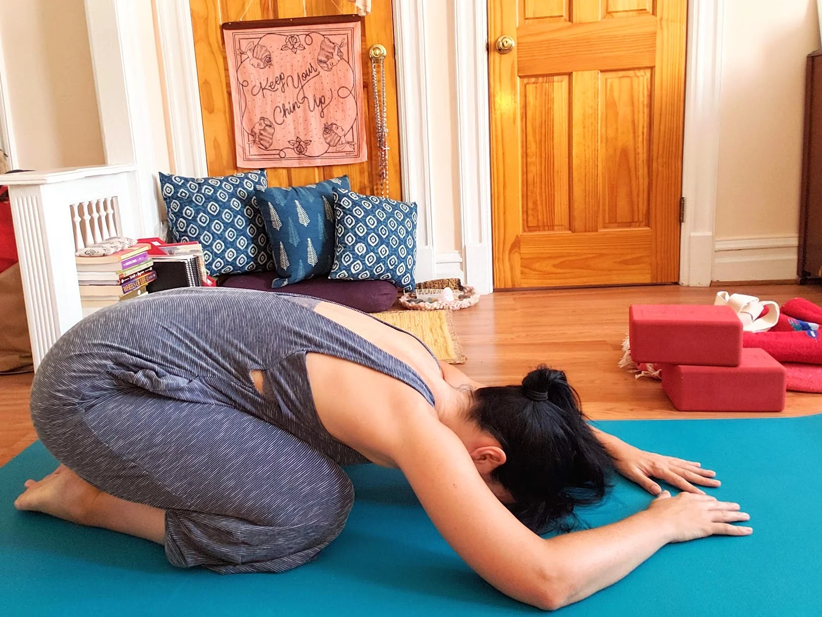 No props. Forehead on mat.