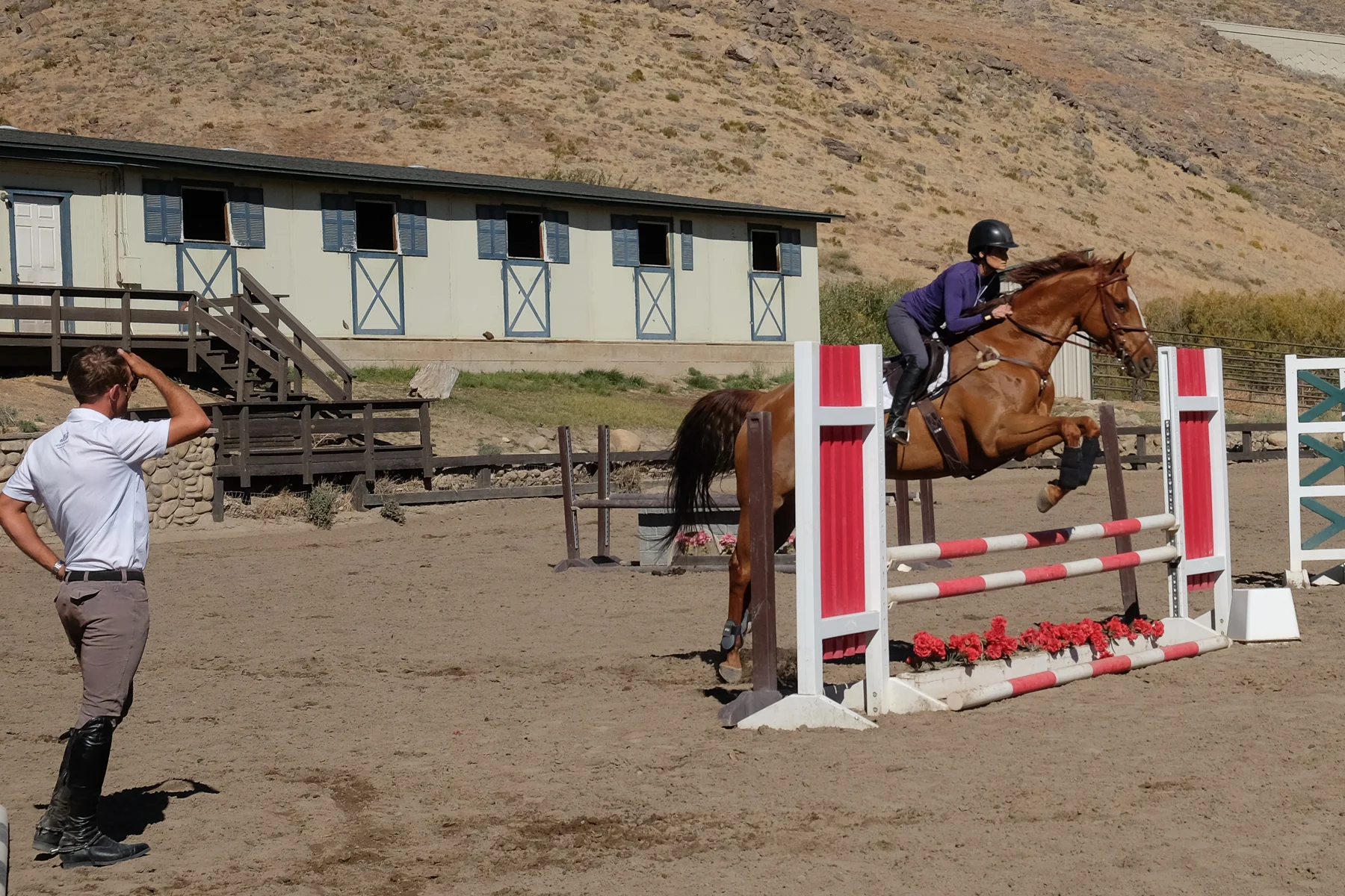 Trainer Andrew Jayne teaches a lesson during camp.