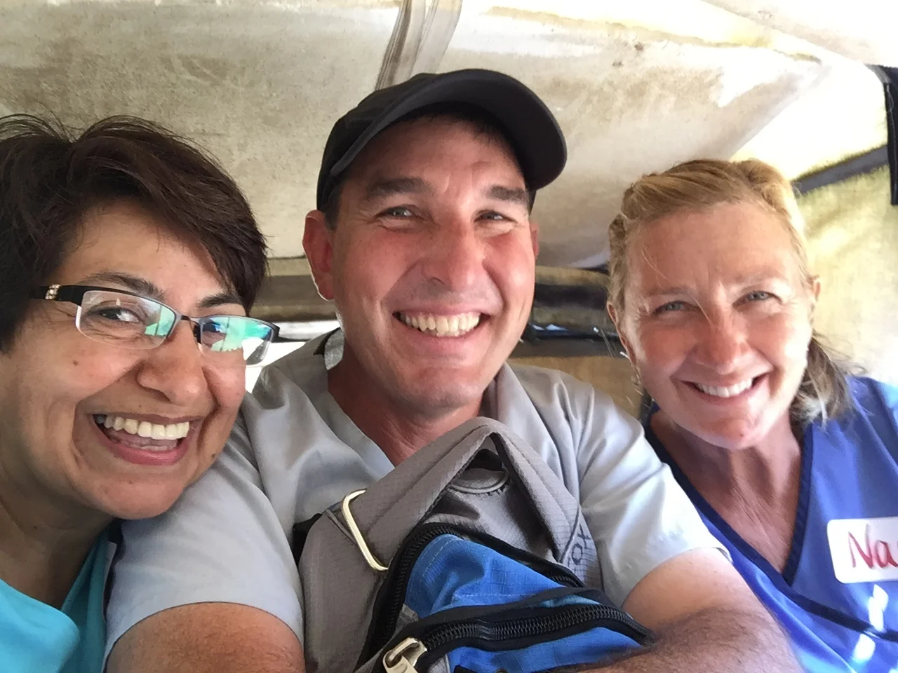 Ileana, Mr. Cox and Mrs. Reid on a tuk tuk ride as they went from home to home providing physical therapy advice and instruction to various people in need. 