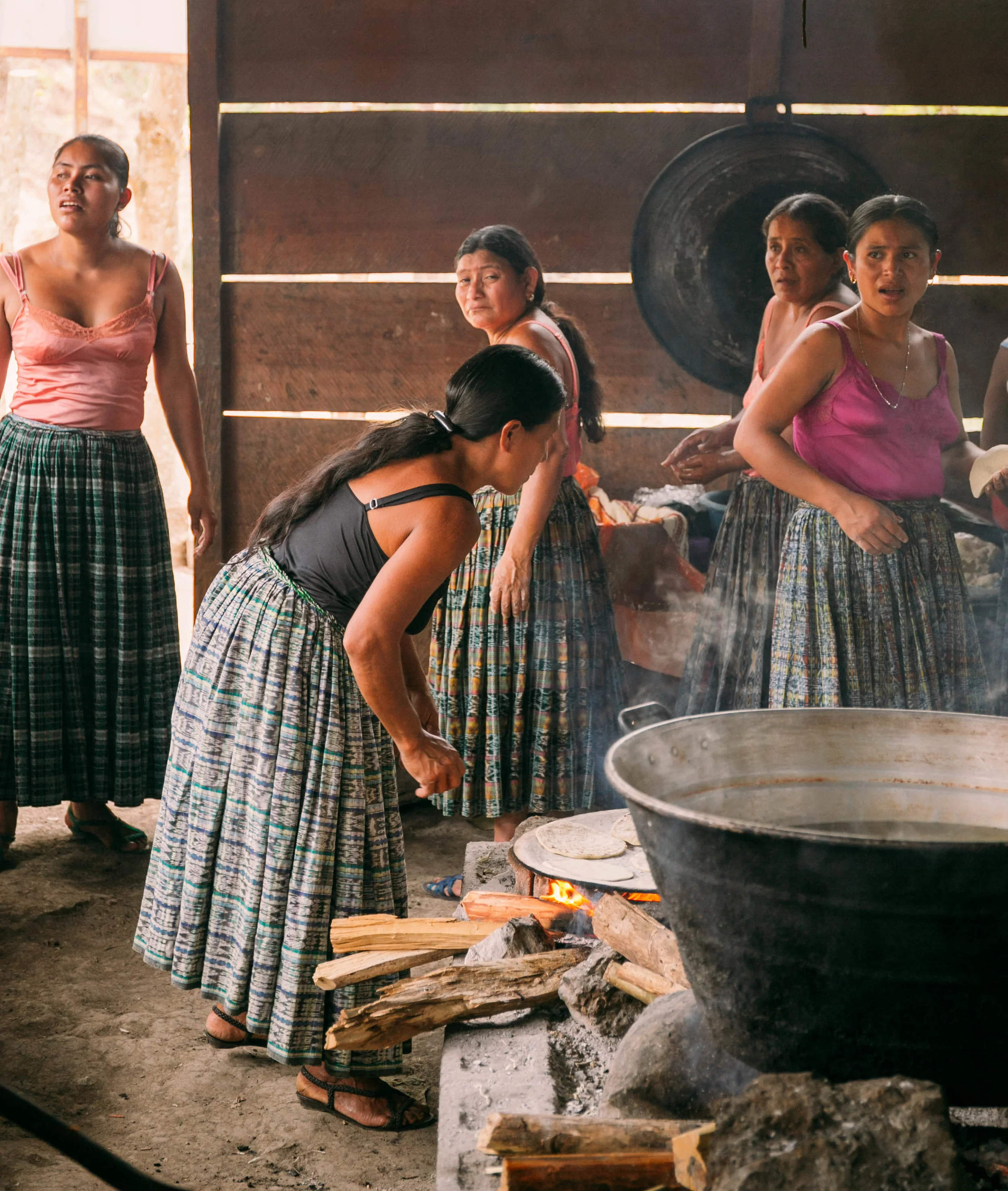 in the school's kitchen, students' parents worked all morning cooking for 60+ people. they gathered funds among them and gave us lunch for three days. it was their way to say thank you. 