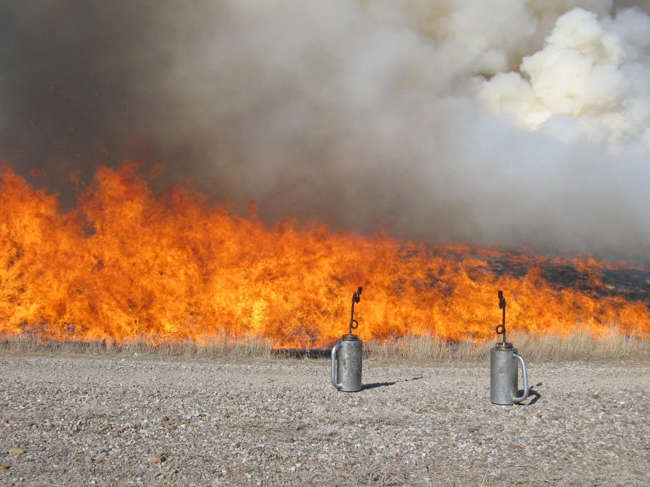 “Drip Torches” by USFWS Mountain-Prairie is licensed under CC By 2.0