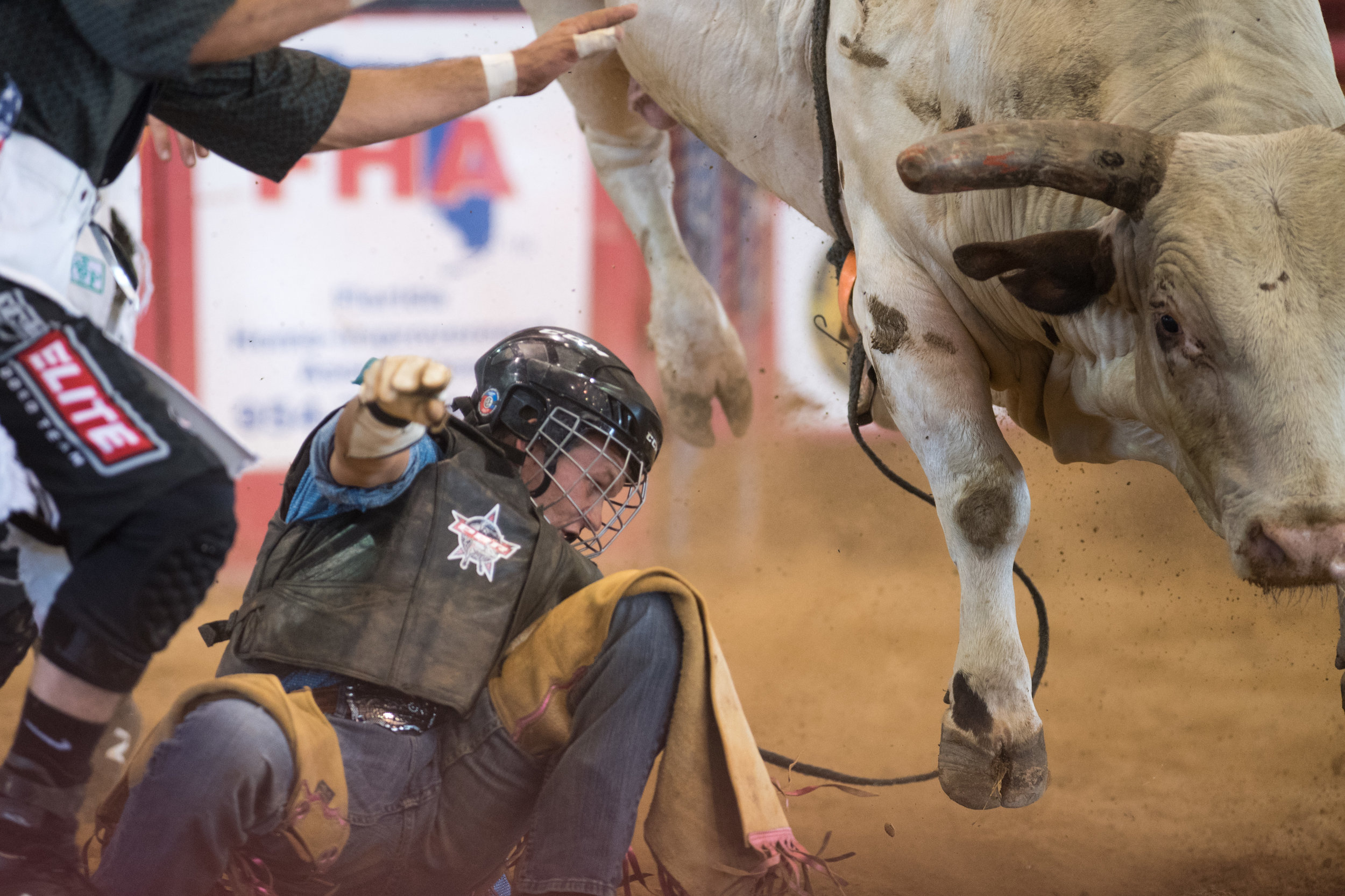  Bull rider Fisher Creason jumps off a bull during the 32nd Annual Weekley Brothers Davie Pro Rodeo for Youth Groups at the Bergeron Rodeo Grounds in Davie, Florida on Friday, June 22, 2018. 