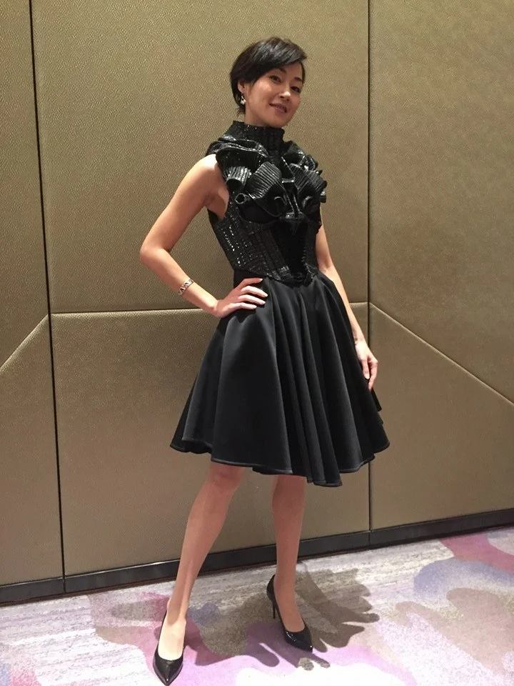 Joey Man 萬綺雯 in XENOMORPH Sculptural Pleated Cocktail Dress