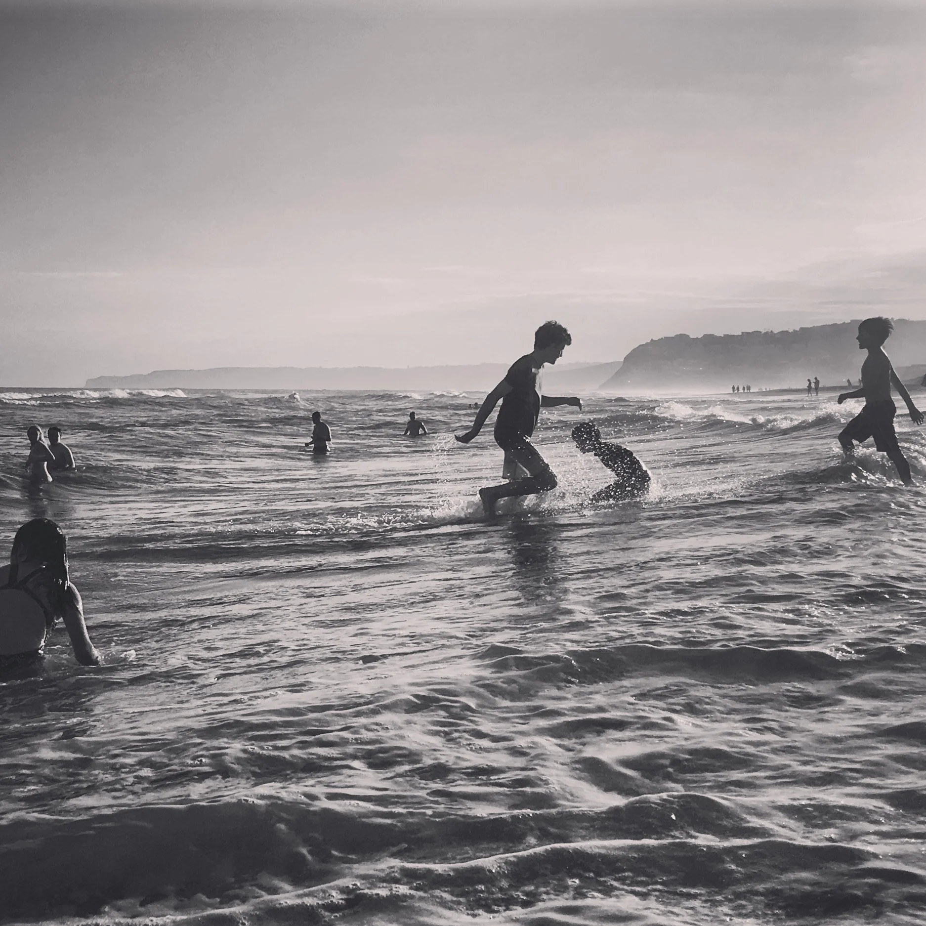 Children-playing-at-bar-beach-in-newcastle-documented-by-australian-portrait-photographer.jpg