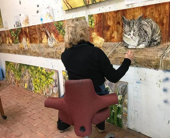 Vicki Junkwright fine tuning panels in the studio
