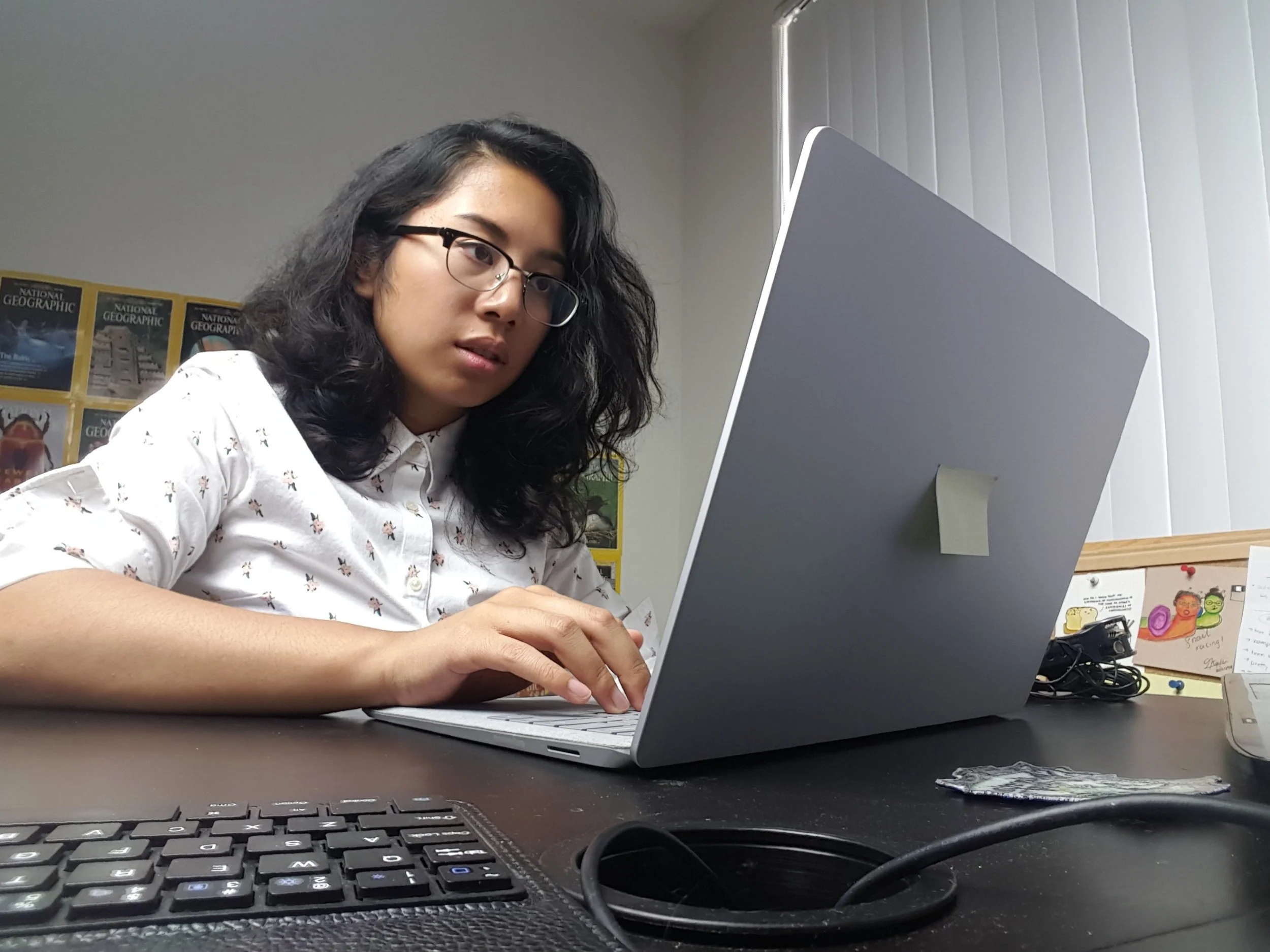 Sabrina Cruz editing or just staring at her screen. We will never know. 
