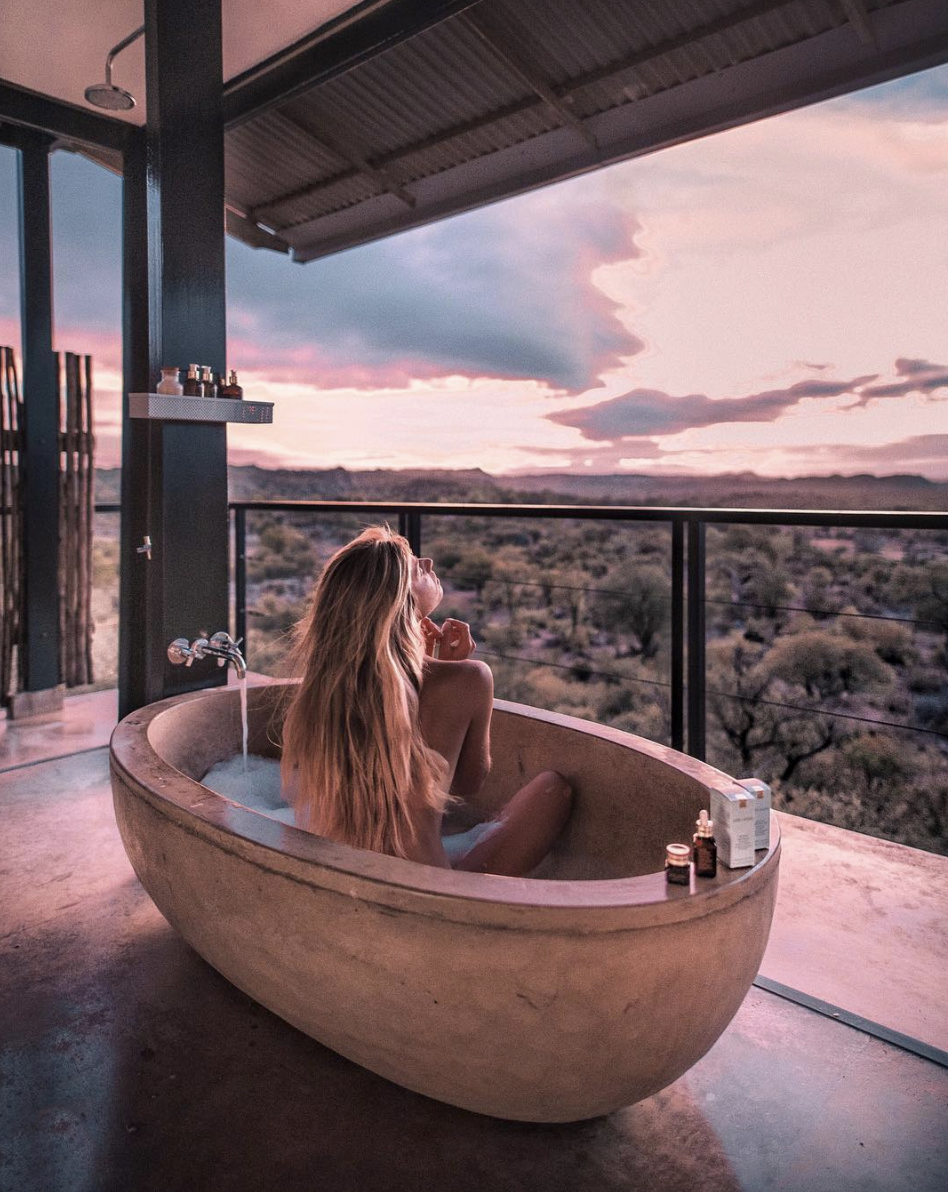 The perfect spot to recover from a long flight! @debiflue pictured here soaking up the glorious views from the comfort of one of our famous bathtubs.