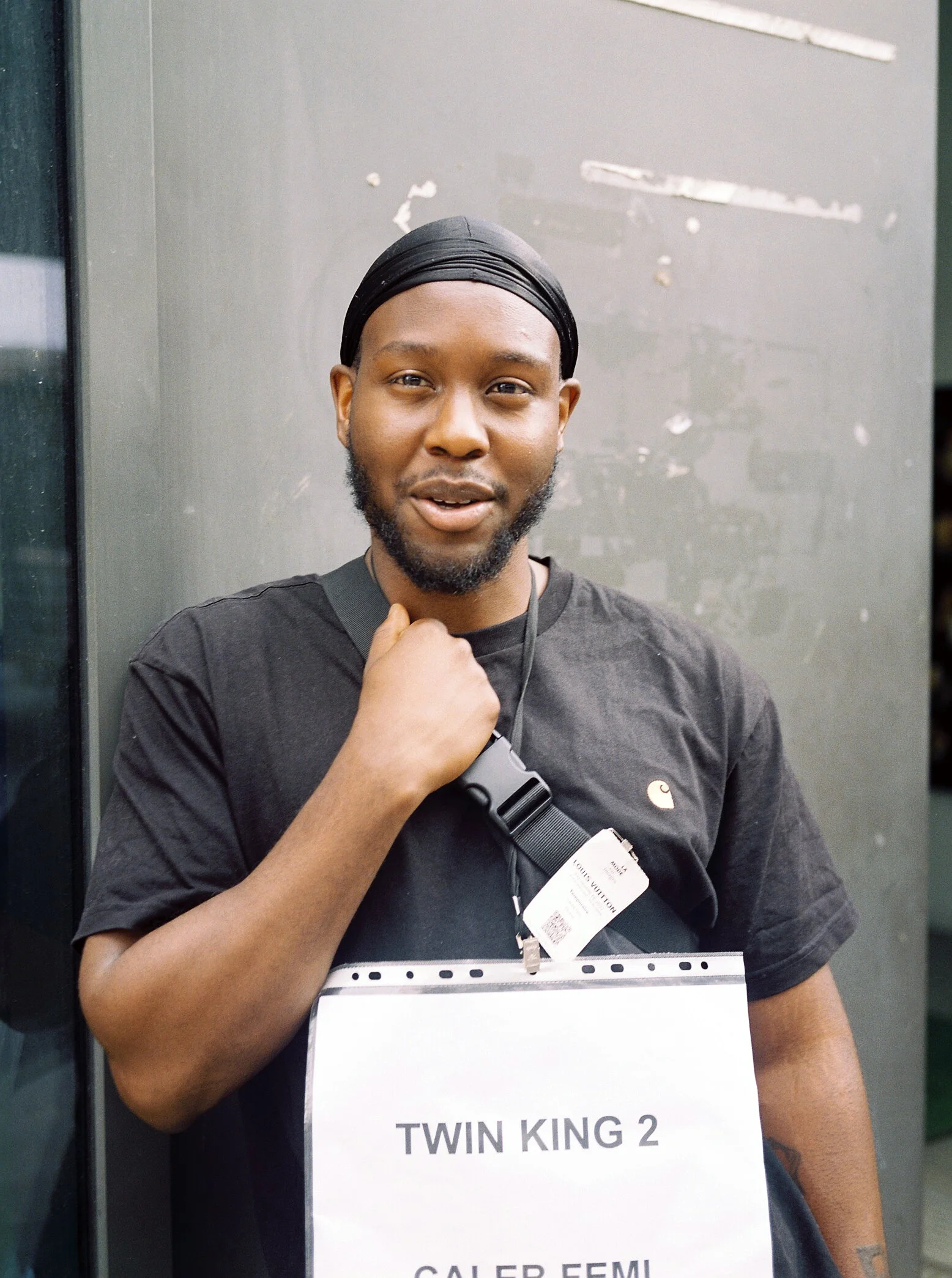  Caleb Femi, backstage at Louis Vuitton; Paris, France. June, 2021.   