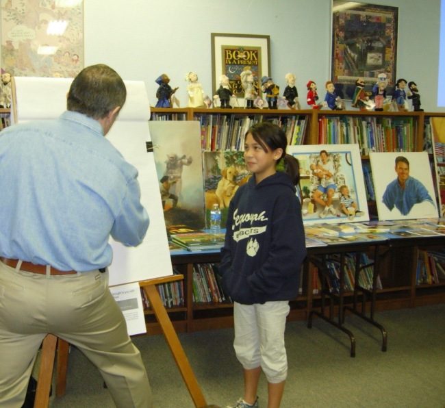 Mike Wimmer demonstrating drawing techniques at Sequoyah Elementary