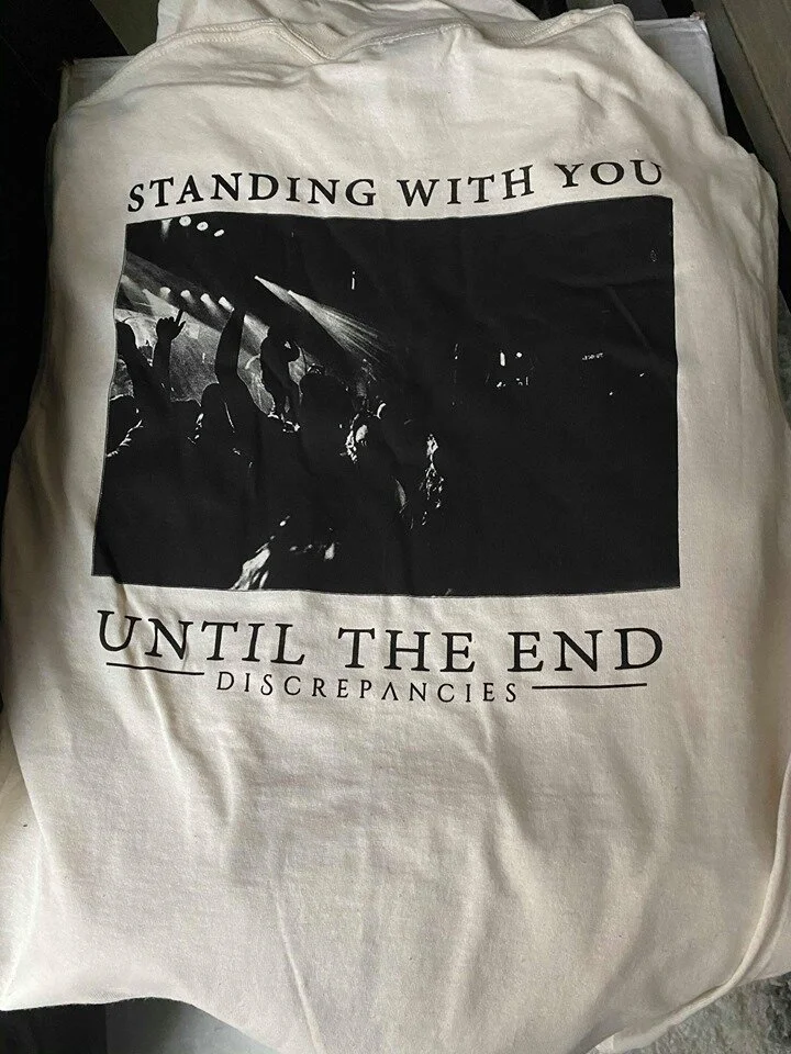 Not Alone T Shirt We Re Standing With You Until The End Cream Discrepancies